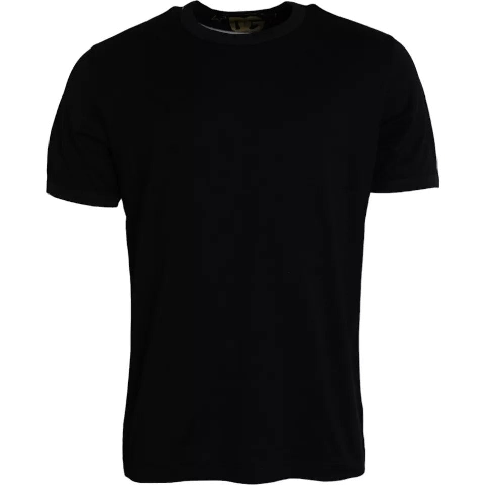 Elevate your style with the Dolce & Gabbana Black Cotton Round Neck T-shirt, a luxurious staple crafted from premium cotton, embodying timeless sophistication and Italian craftsmanship.