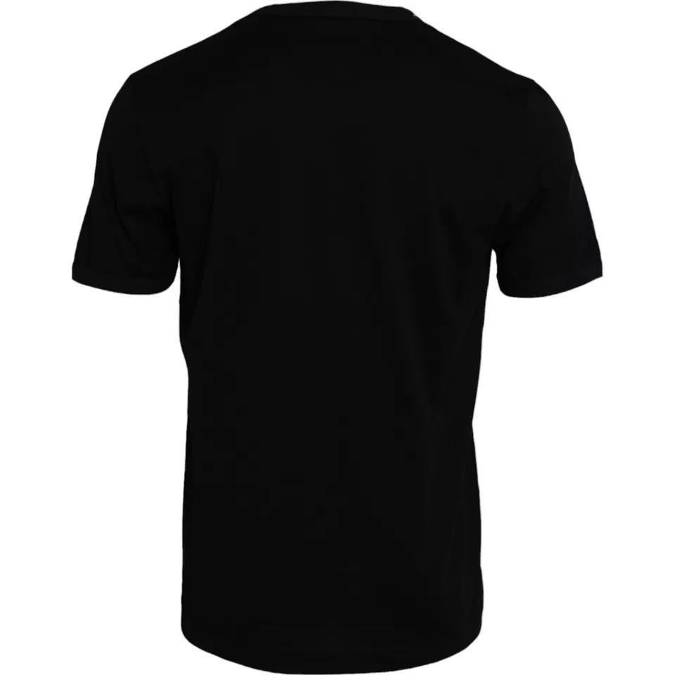 Elevate your style with the Dolce & Gabbana Black Cotton Round Neck T-shirt, a luxurious staple crafted from premium cotton, embodying timeless sophistication and Italian artistry.