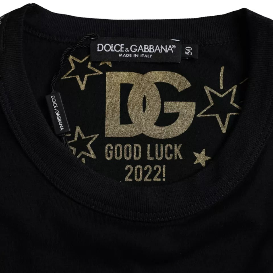 Elevate your wardrobe with the Dolce & Gabbana Black Cotton Round Neck T-shirt, a luxurious staple crafted from 100% cotton, embodying timeless sophistication and artisanal elegance.