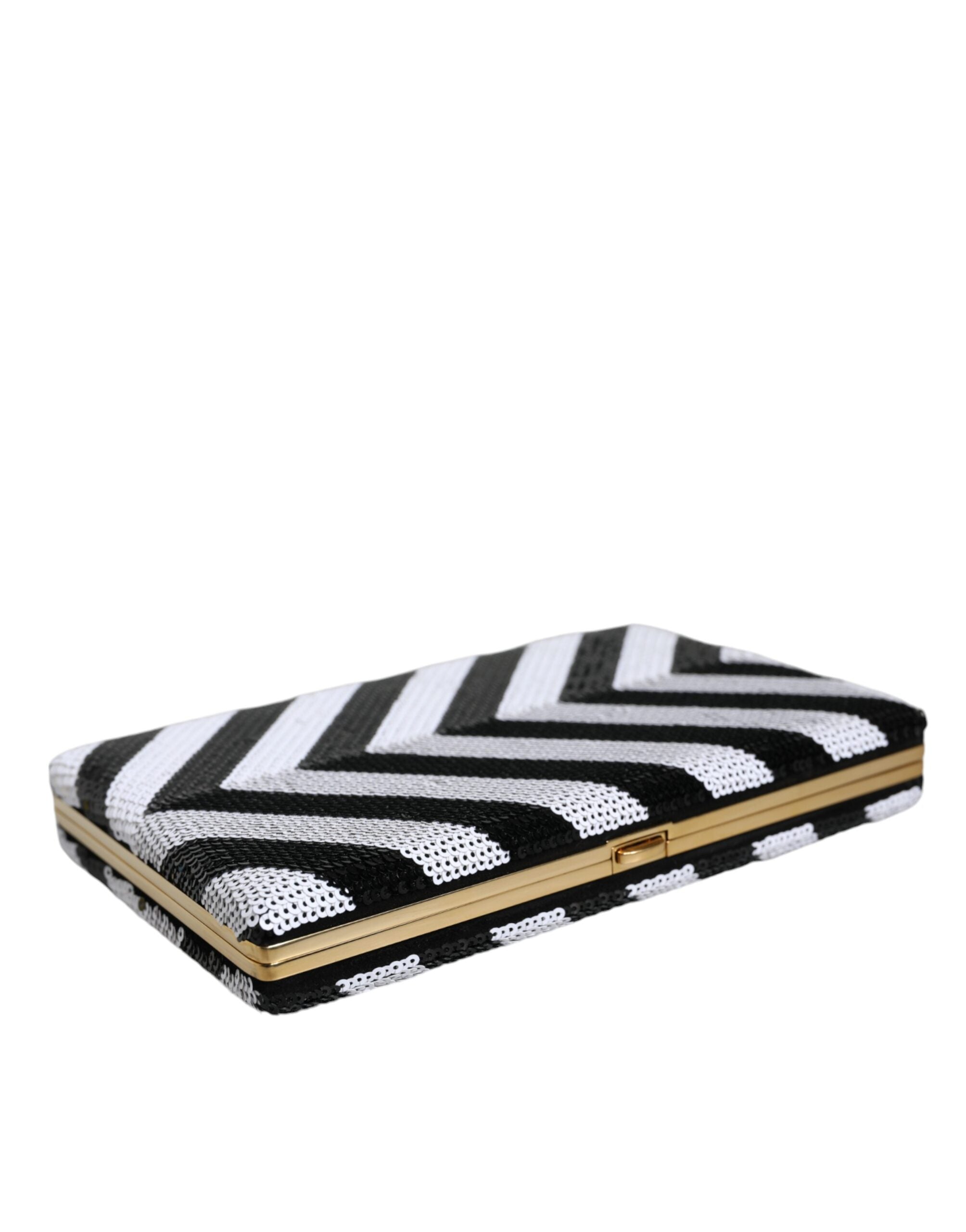 Indulge in the exquisite Dolce & Gabbana Black White Gold Frame Clutch, a masterpiece of Italian craftsmanship blending luxurious materials for timeless sophistication.