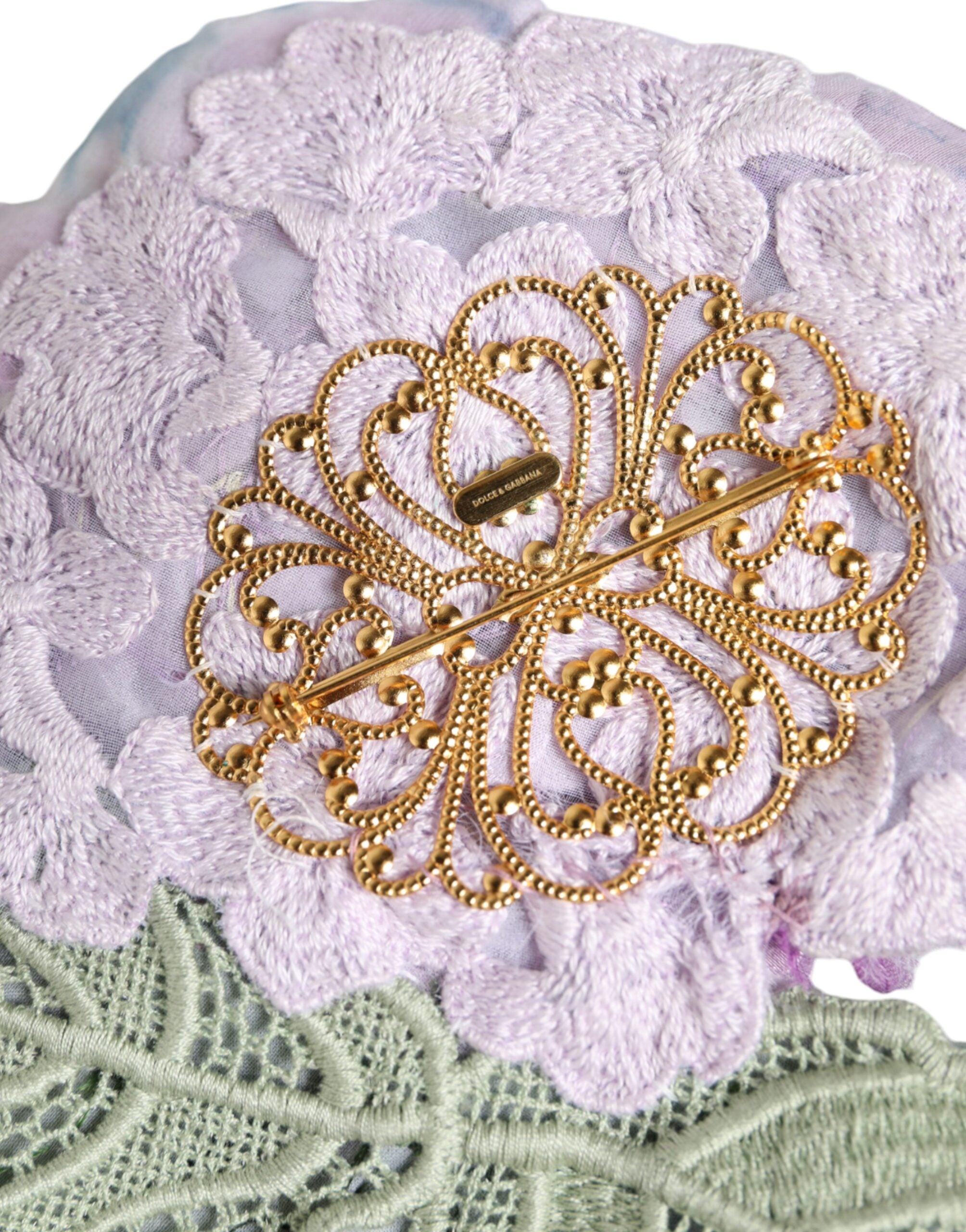 Discover the Dolce & Gabbana Multicolor Hydrangea Gold Brass Pin Brooch, a luxurious blend of silk and brass, embodying timeless elegance and exquisite craftsmanship.