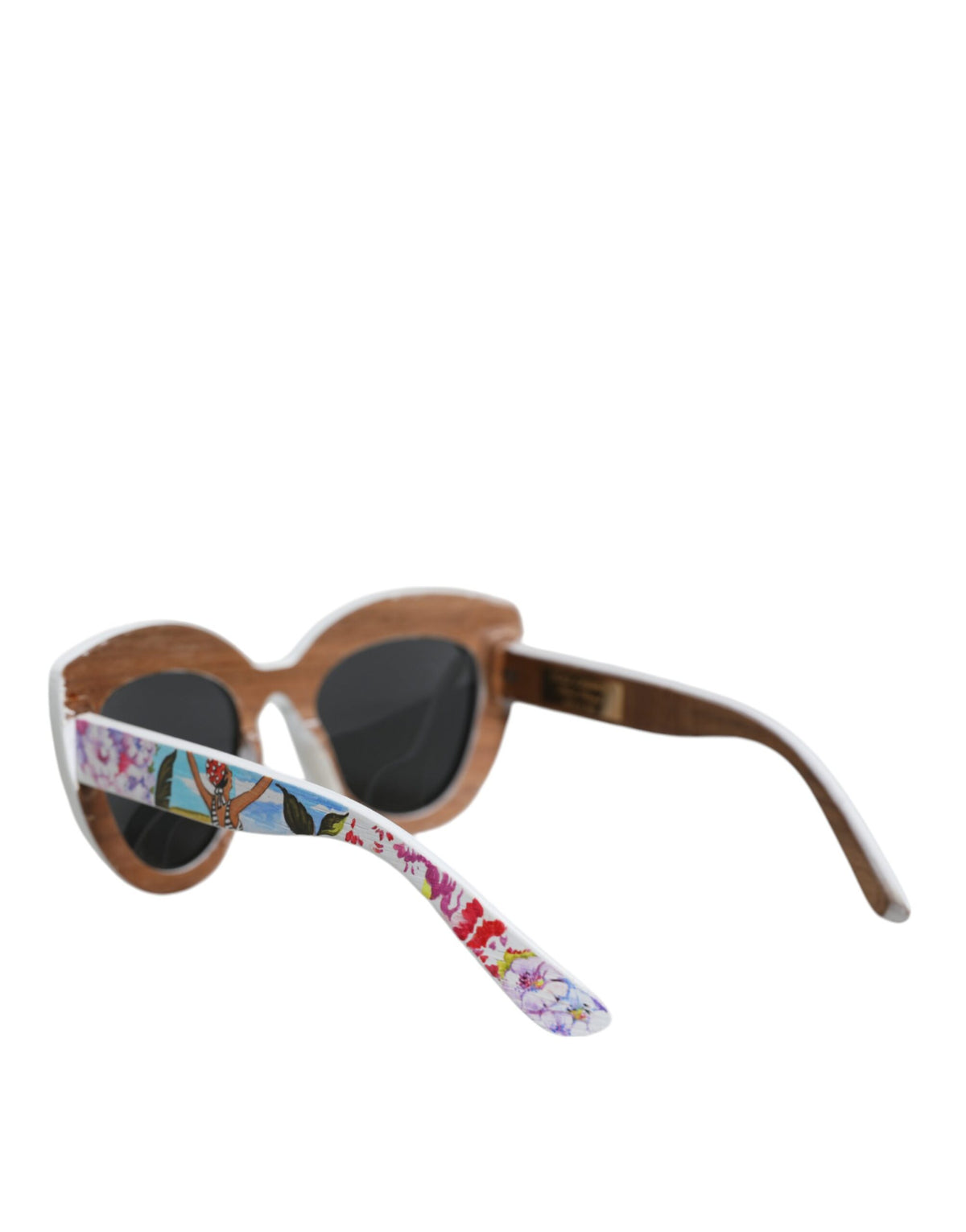 Discover the allure of Dolce & Gabbana's Floral Hand Paint Sunglasses, where exquisite craftsmanship meets nature in a luxurious celebration of femininity and elegance.