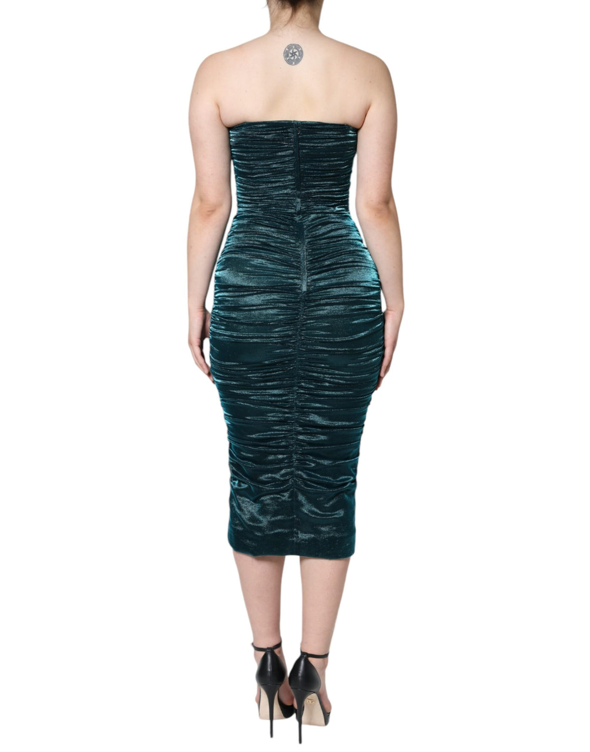 Discover the Dolce & Gabbana Green Silk Blend Satin Fitted Strapless Dress, a couture masterpiece that embodies luxury, artistry, and timeless elegance for unforgettable moments.