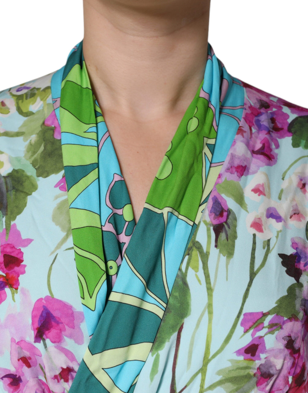 Experience the allure of the Dolce & Gabbana Multicolor Floral Silk Stretch Wrap Dress, a testament to Italian craftsmanship that embodies elegance and sophistication for every occasion.