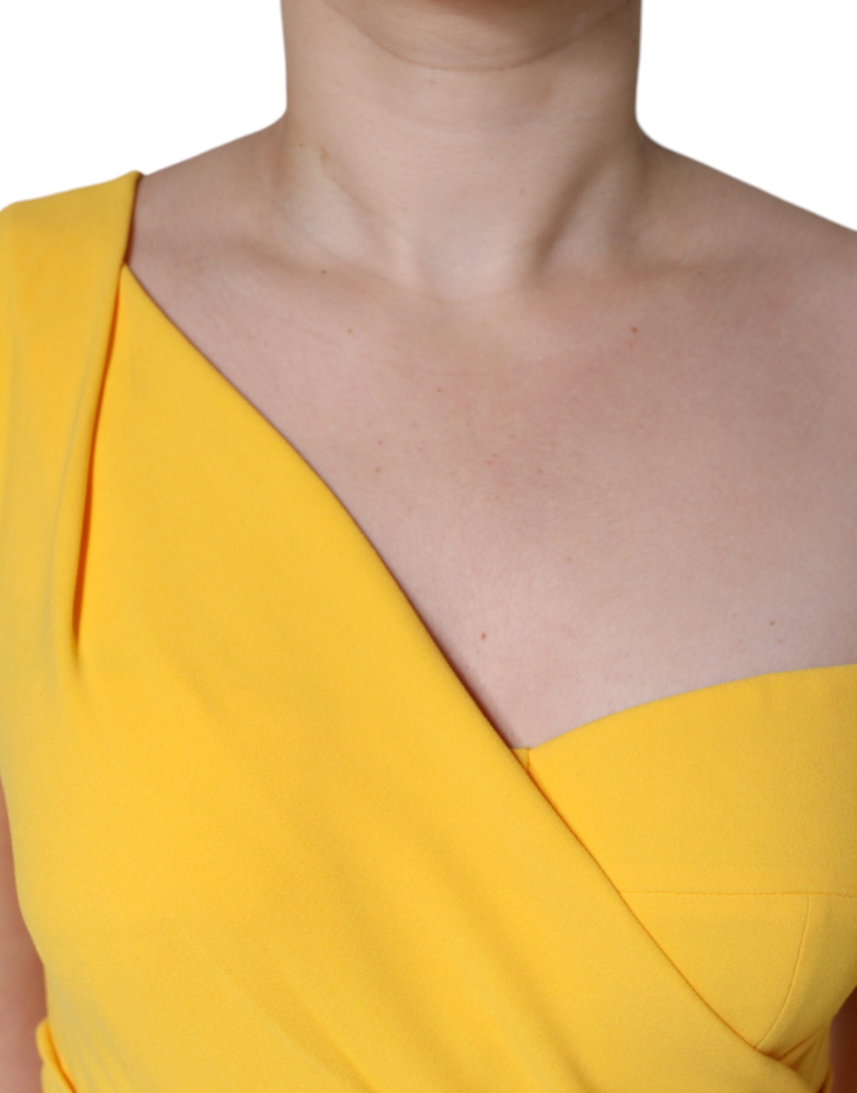 Experience the exquisite allure of the Dolce & Gabbana Yellow One Shoulder Midi Dress, crafted from luxurious materials, embodying timeless elegance for every sophisticated occasion.
