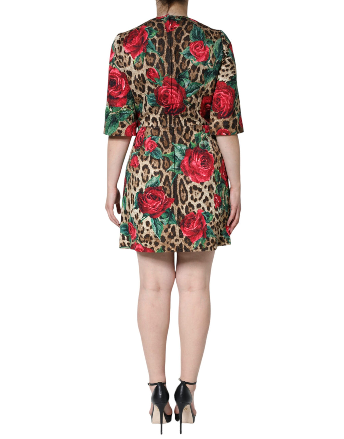 Indulge in the exquisite Dolce & Gabbana Brown Leopard Red Roses A-line Dress, where luxurious fabrics and masterful craftsmanship redefine elegance for the discerning individual.