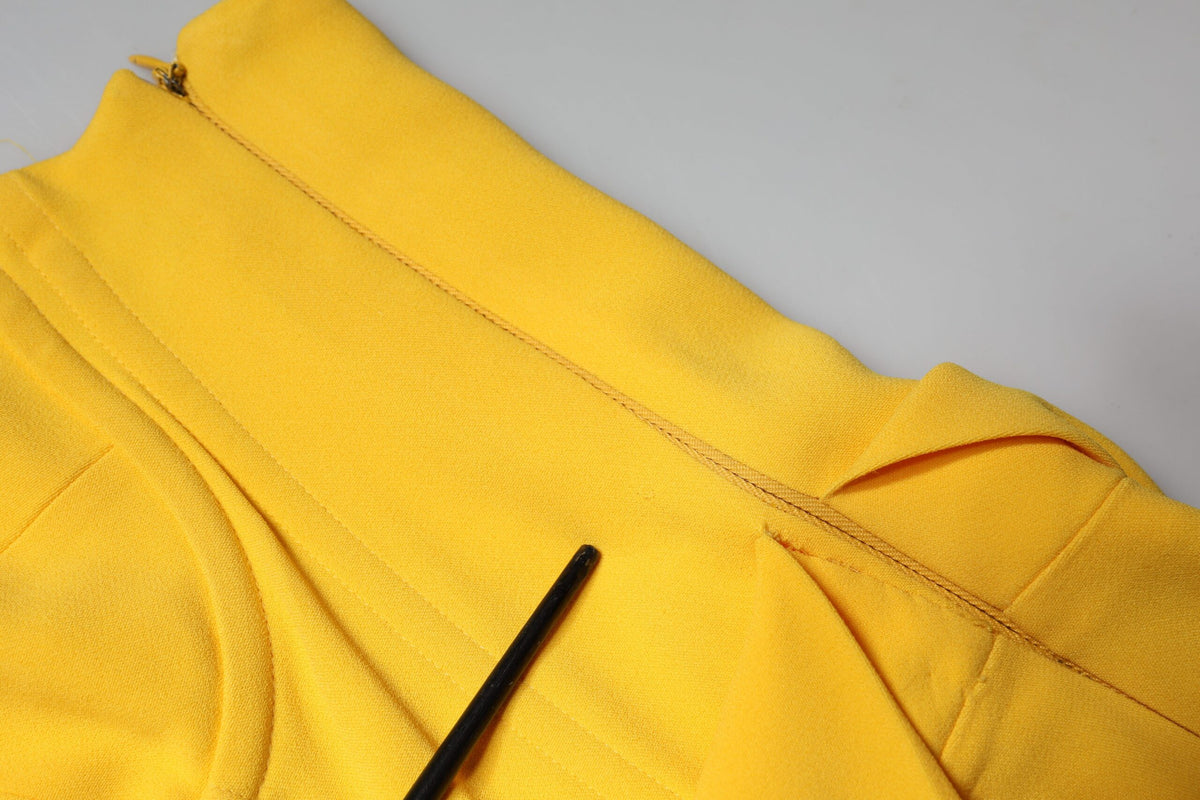 Elevate your allure with the Dolce & Gabbana Yellow One Shoulder Midi Dress, a masterpiece of Italian craftsmanship in luxurious silk and viscose, perfect for any sophisticated occasion.