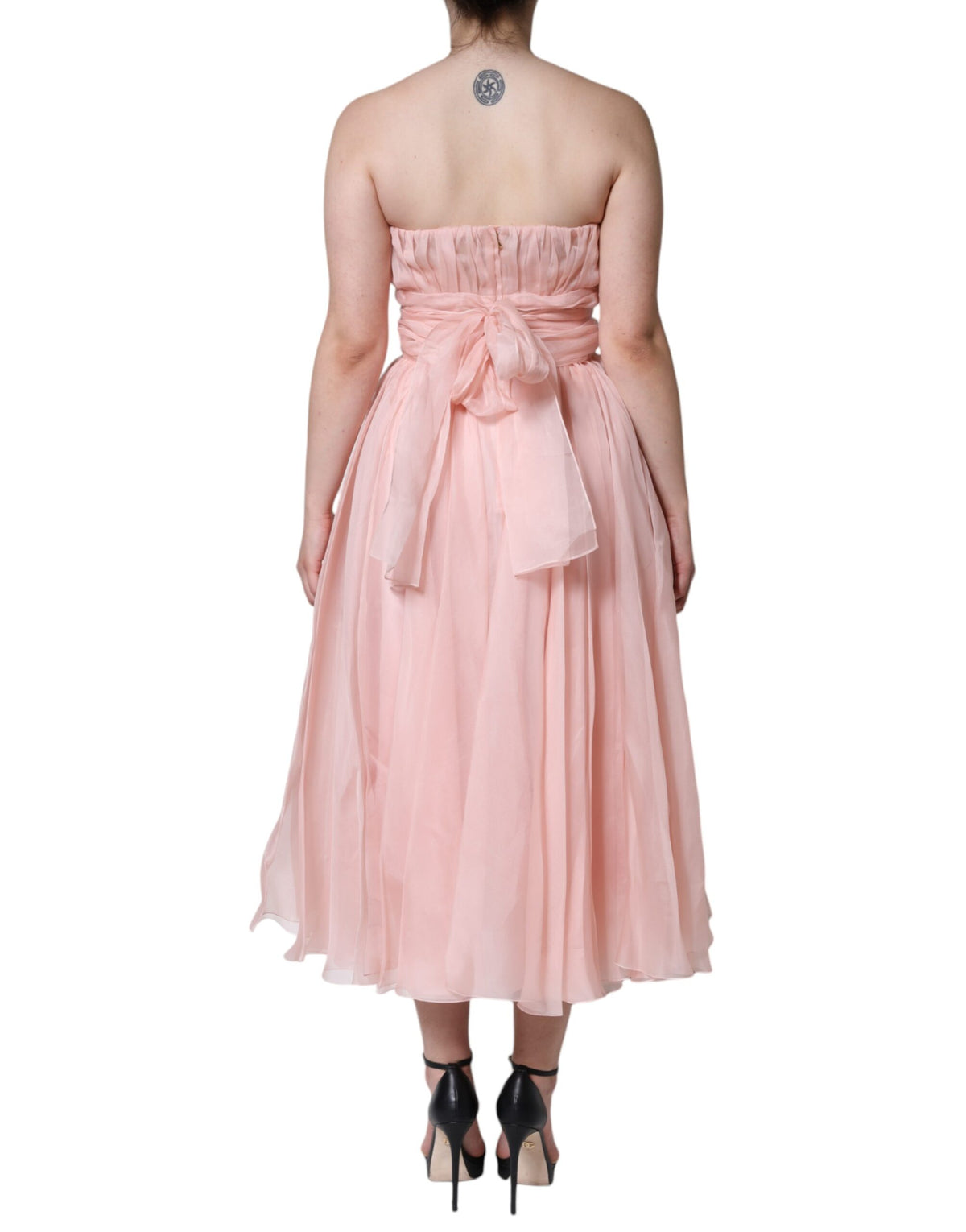 Experience the exquisite allure of the Dolce & Gabbana Pink Silk Strapless Maxi A-line Gown, a timeless masterpiece that embodies luxury and sophistication, perfect for unforgettable moments.