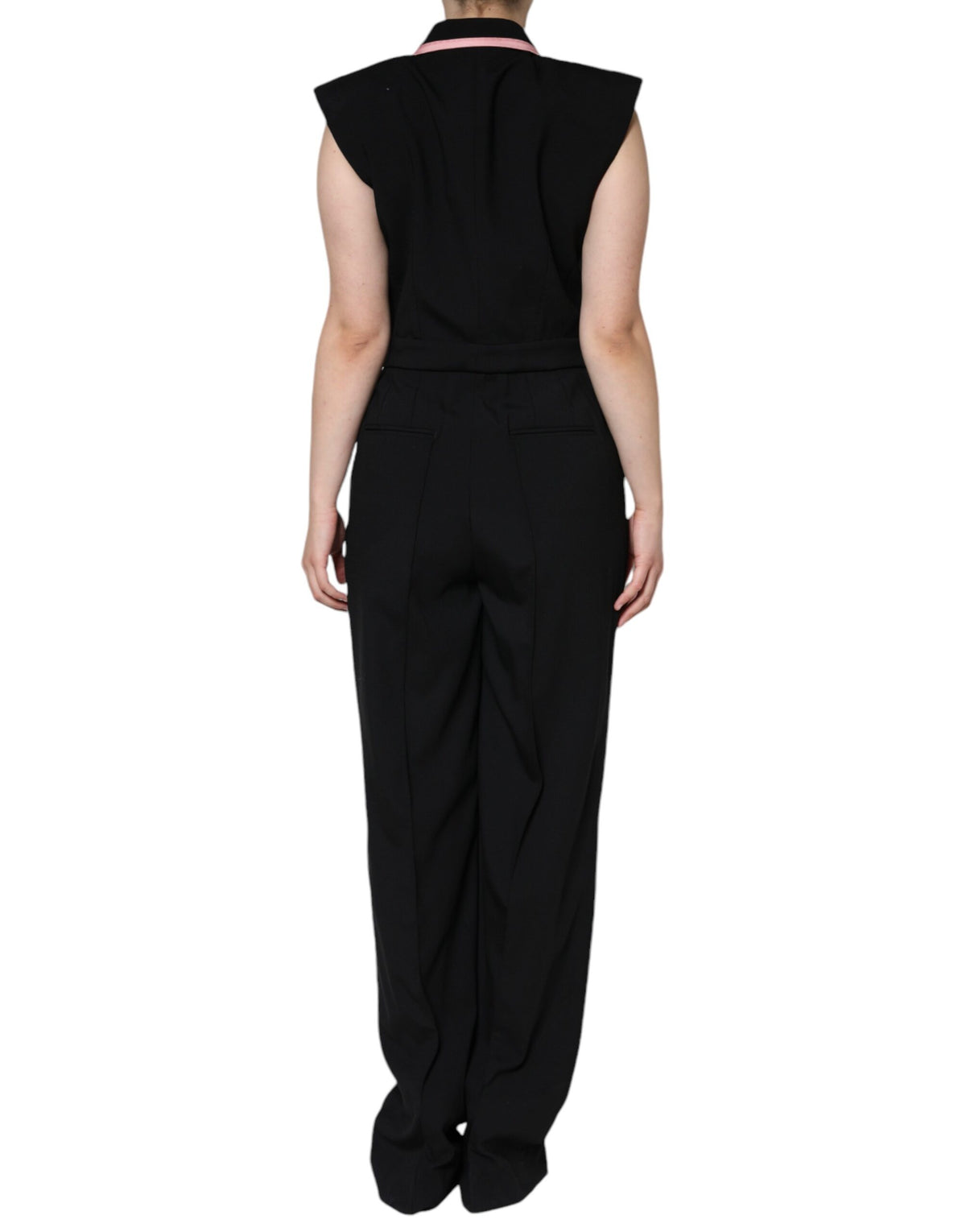 Indulge in the Dolce & Gabbana Black Wool Blend Sleeveless Jumpsuit Dress, a luxurious masterpiece crafted from exquisite materials, embodying elegance and sophistication for the discerning individual.