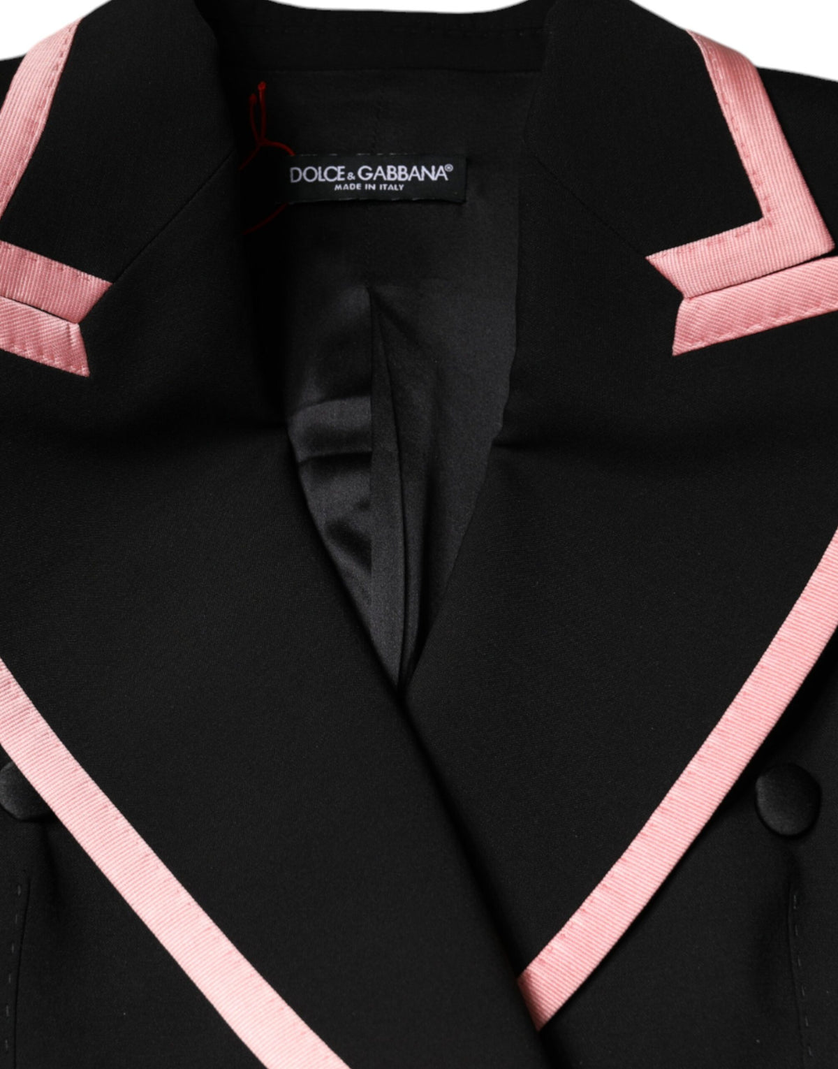 Elevate your wardrobe with the Dolce & Gabbana Black Wool Blend Sleeveless Jumpsuit Dress, a masterpiece of Italian craftsmanship, blending luxury and sophistication for the discerning individual.