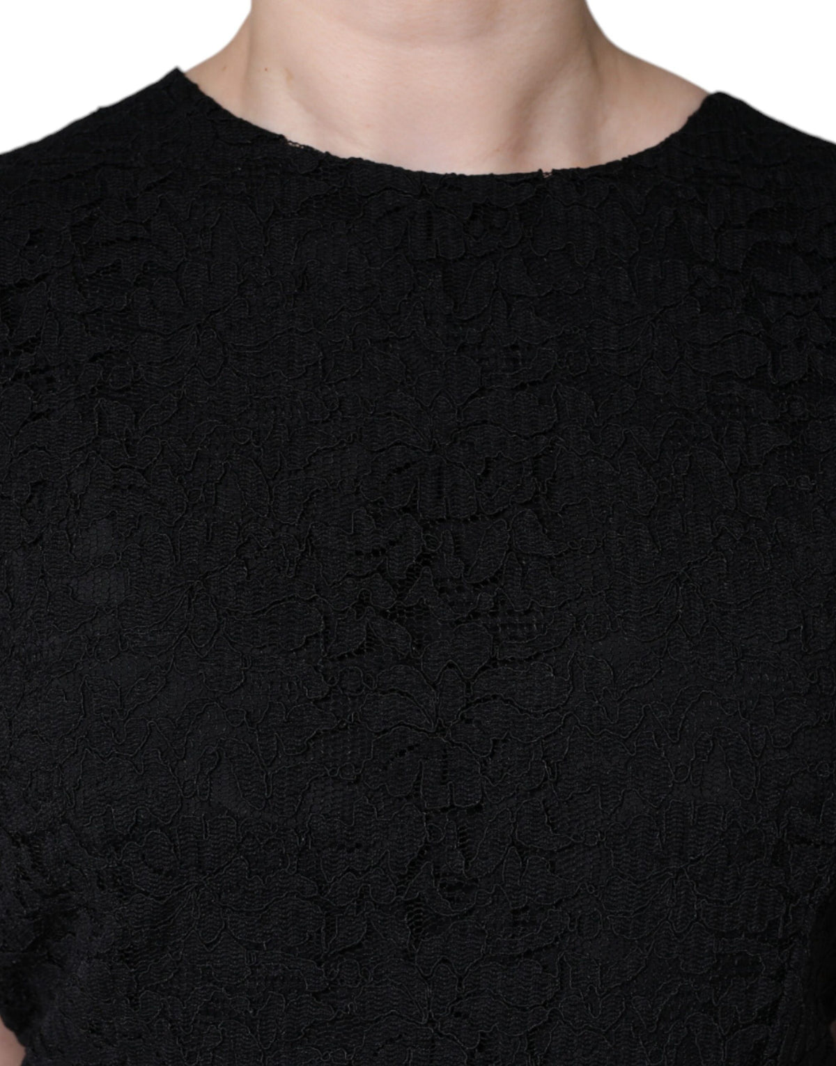 Experience the allure of the Dolce & Gabbana Black Cotton Sheath Knee Length Dress, a masterpiece of Italian craftsmanship that embodies timeless elegance and sophistication.