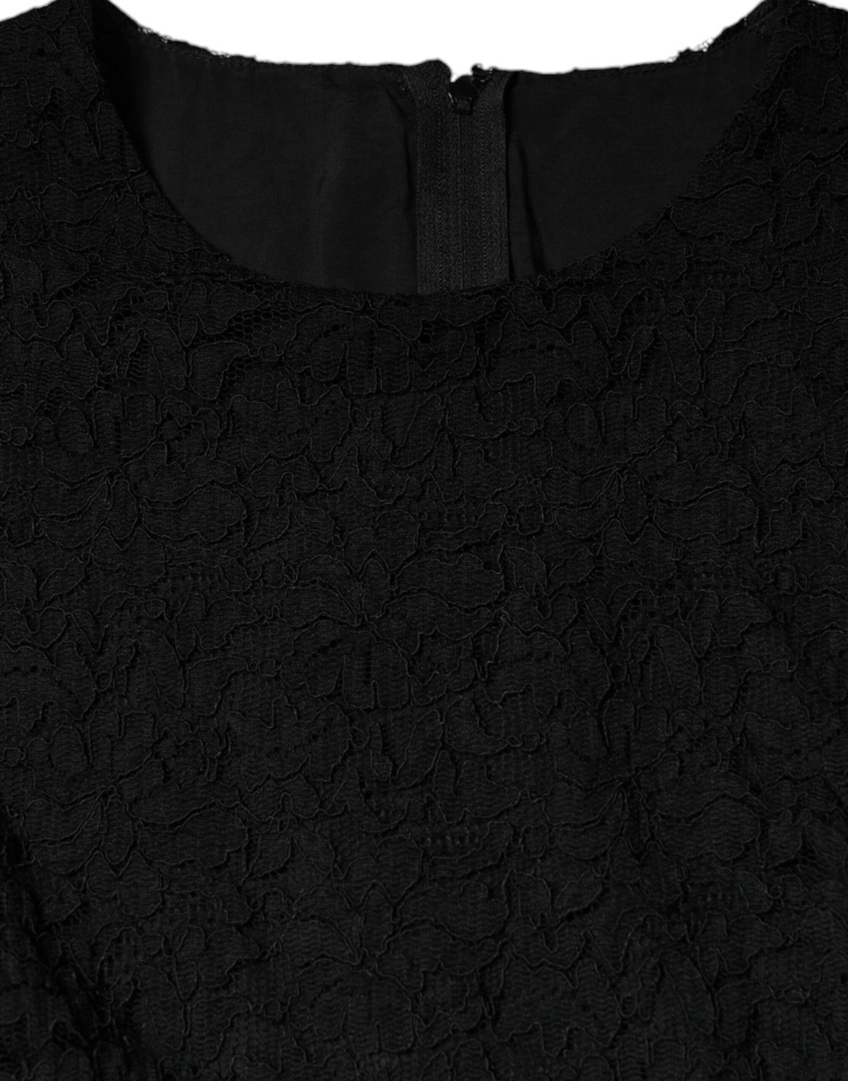 Indulge in the exquisite Dolce & Gabbana Black Cotton Sheath Dress, a timeless masterpiece crafted in Italy, designed to elevate your elegance and allure.