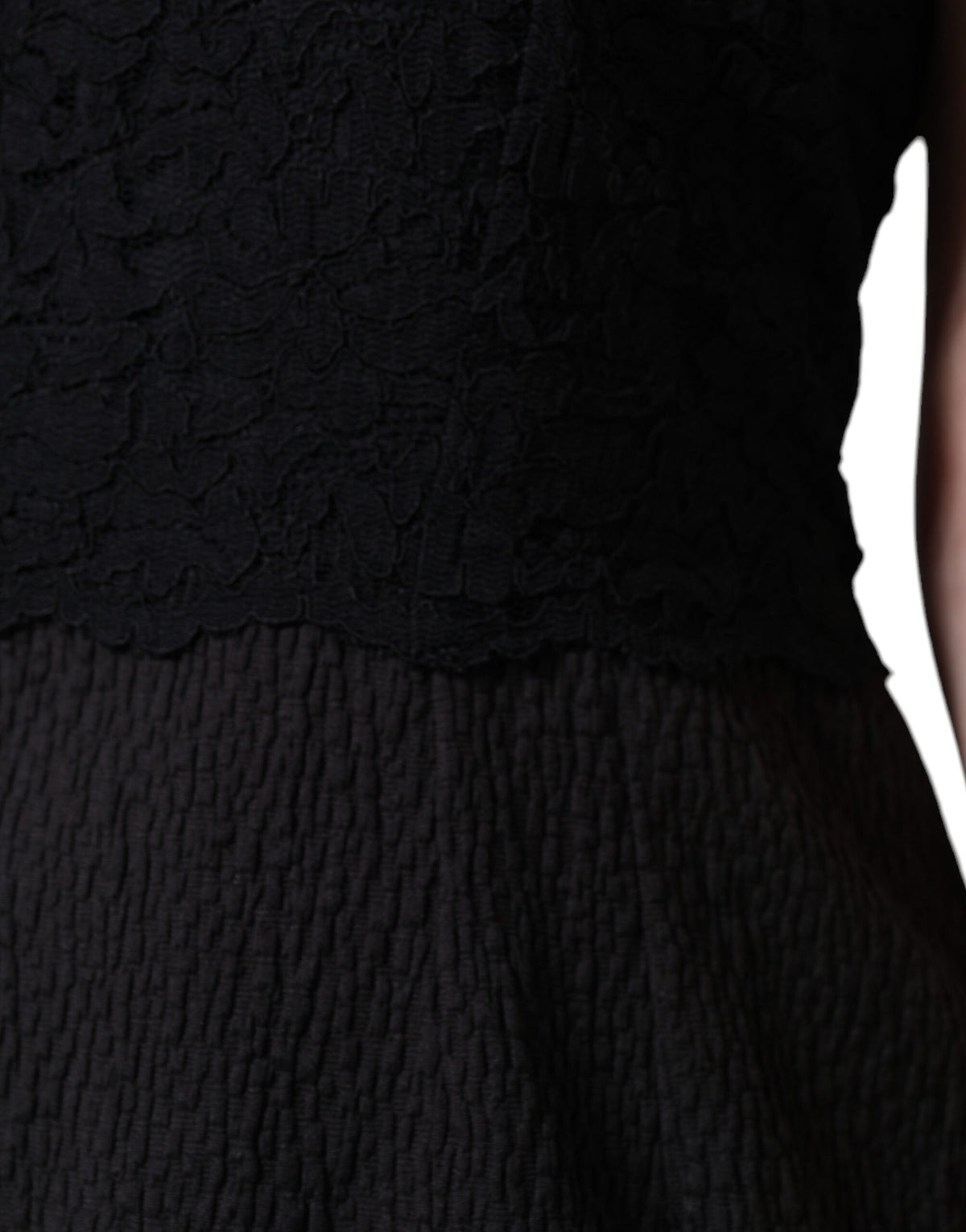 Indulge in the exquisite Dolce & Gabbana Black Cotton Sheath Knee Length Dress, where Italian craftsmanship meets timeless elegance, perfect for the discerning individual.