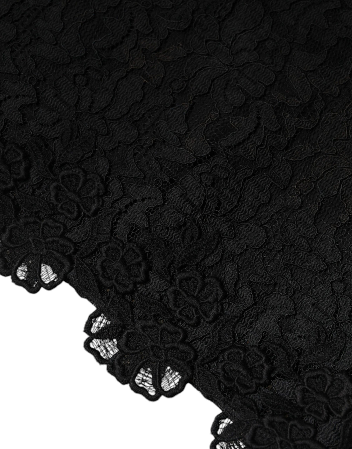 Indulge in the exquisite allure of the Dolce & Gabbana Black Floral Lace Sheath Mini Dress, a timeless masterpiece crafted from luxurious materials for the discerning individual.