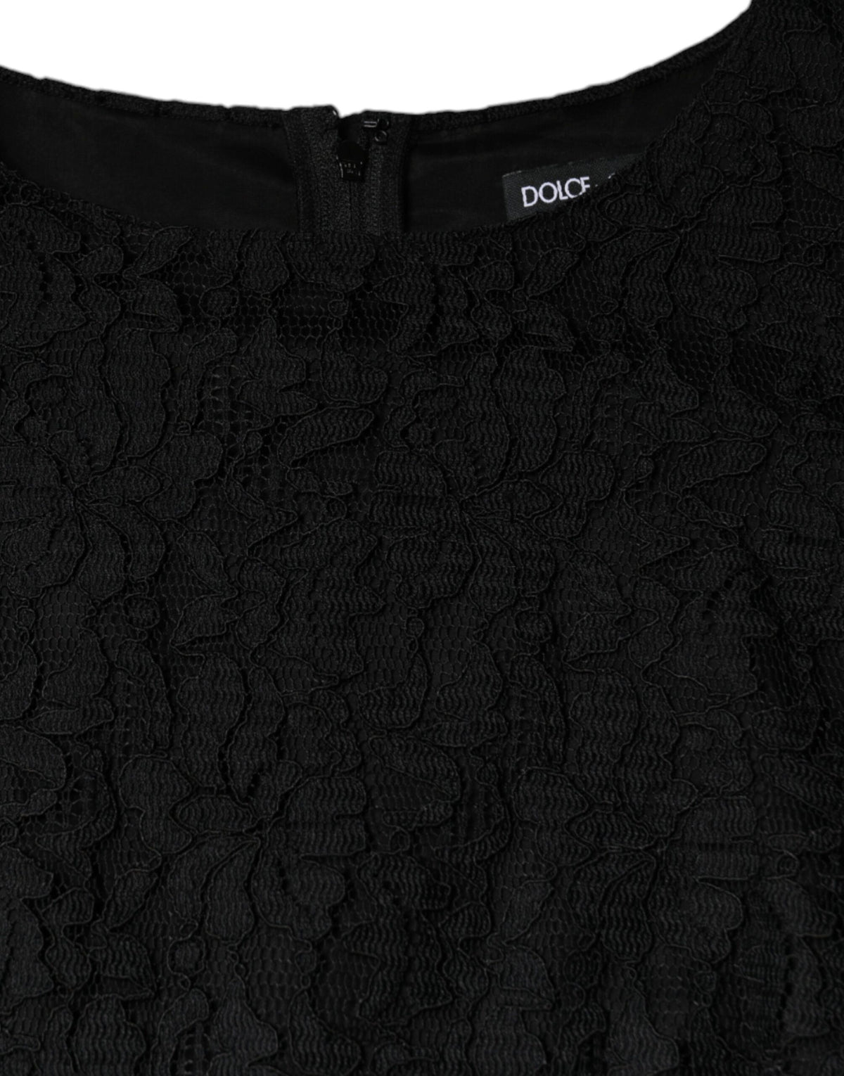 Indulge in the exquisite allure of the Dolce & Gabbana Black Floral Lace Sheath Mini Dress, a timeless masterpiece crafted in Italy for the discerning individual seeking elegance and sophistication.