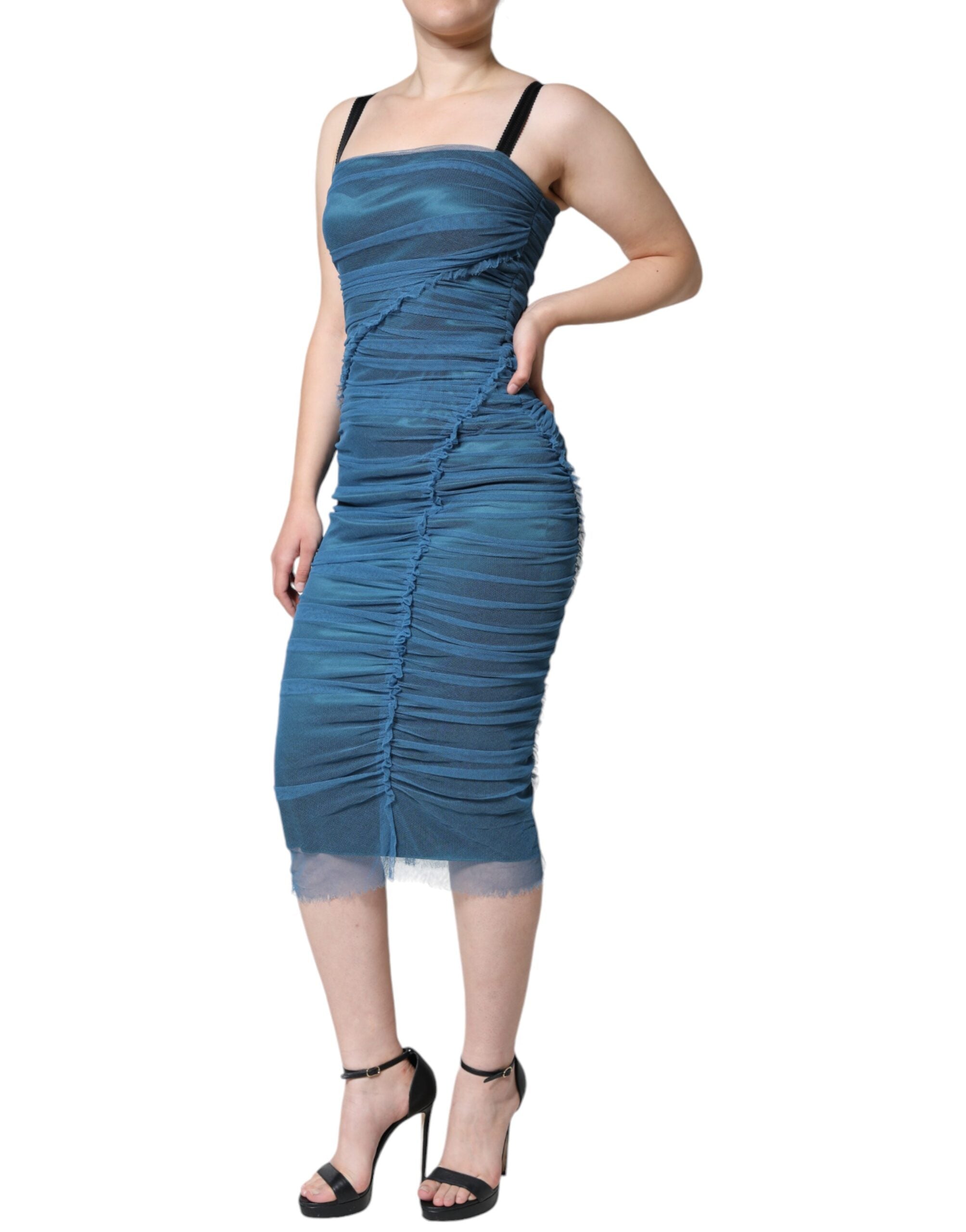 Indulge in the exquisite allure of the Dolce & Gabbana Blue Mesh Trim Ruched Tulle Sheath Dress, a timeless masterpiece that redefines elegance and sophistication.