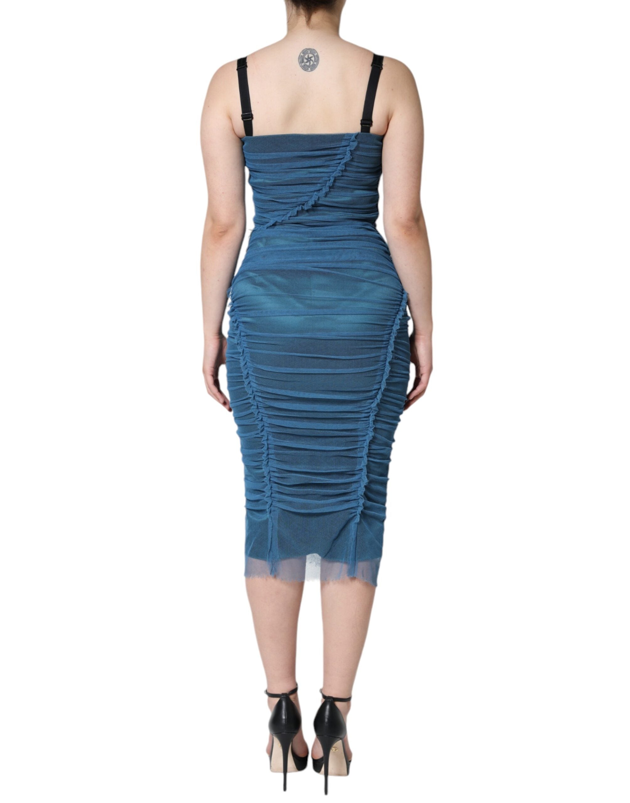 Indulge in the exquisite allure of the Dolce & Gabbana Blue Mesh Trim Ruched Tulle Sheath Dress, a masterpiece of luxurious craftsmanship and timeless elegance, perfect for sophisticated occasions.