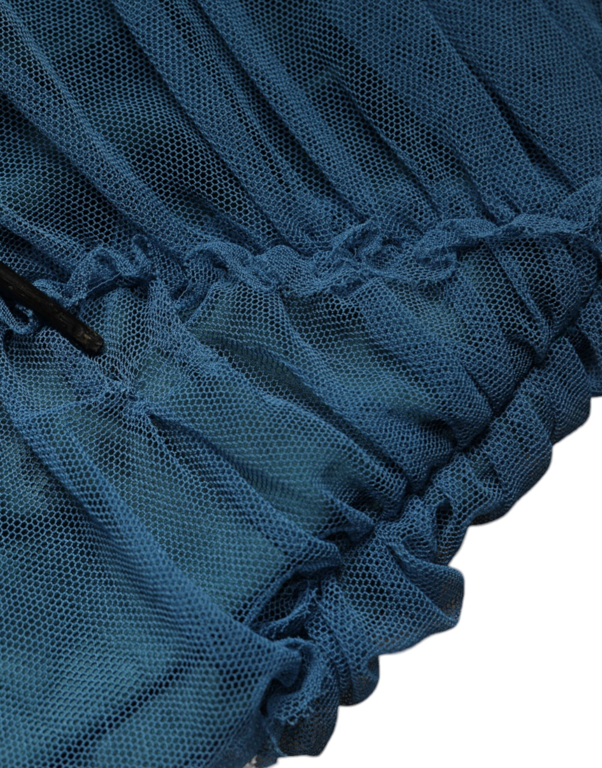 Indulge in the exquisite allure of the Dolce & Gabbana Blue Mesh Trim Ruched Tulle Sheath Dress, where luxurious fabrics and timeless design redefine elegance for the discerning individual.