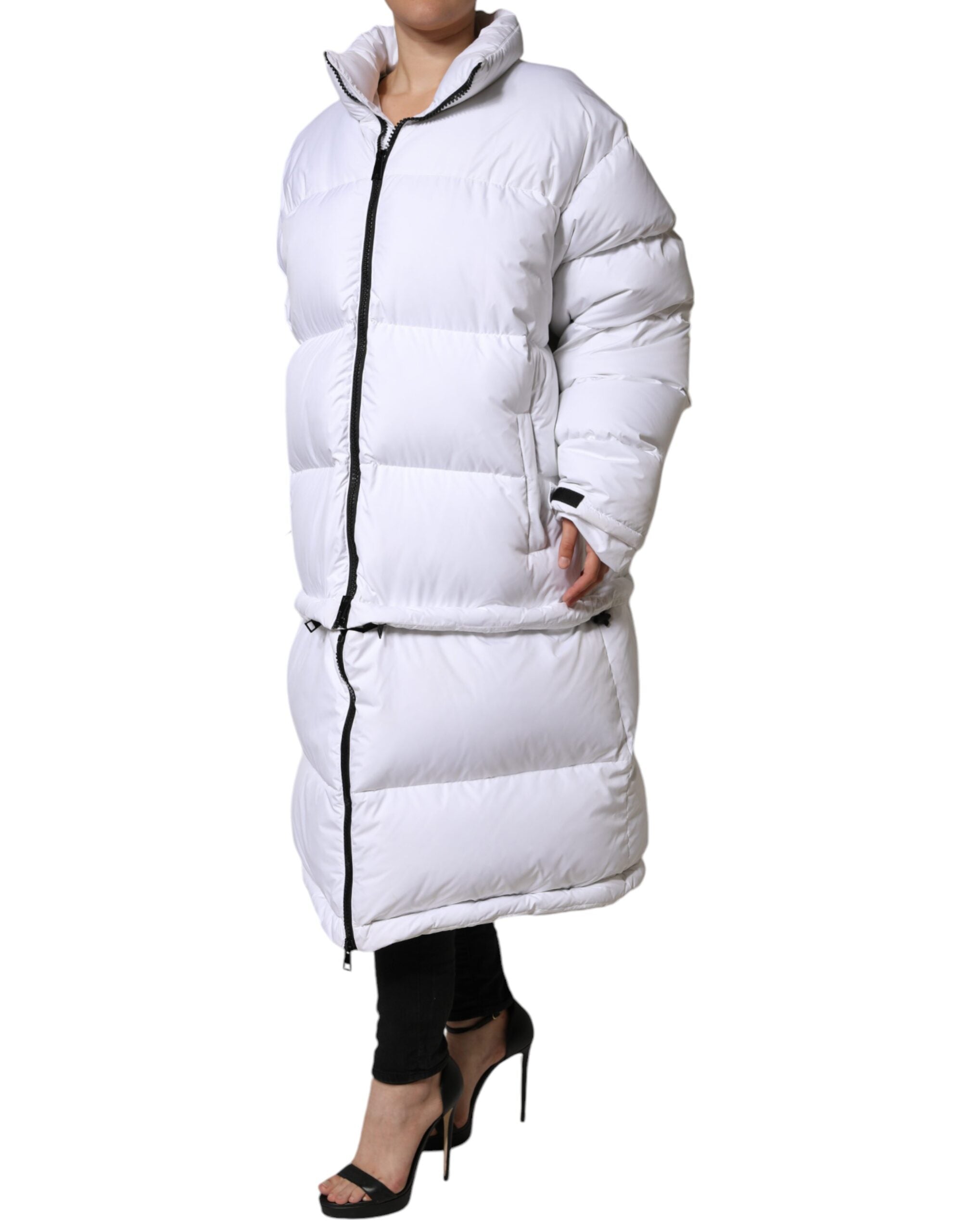 Indulge in the luxurious Dolce & Gabbana White Puffer Quilted Full Zip Coat, crafted from premium nylon for an exquisite blend of style and sophistication.