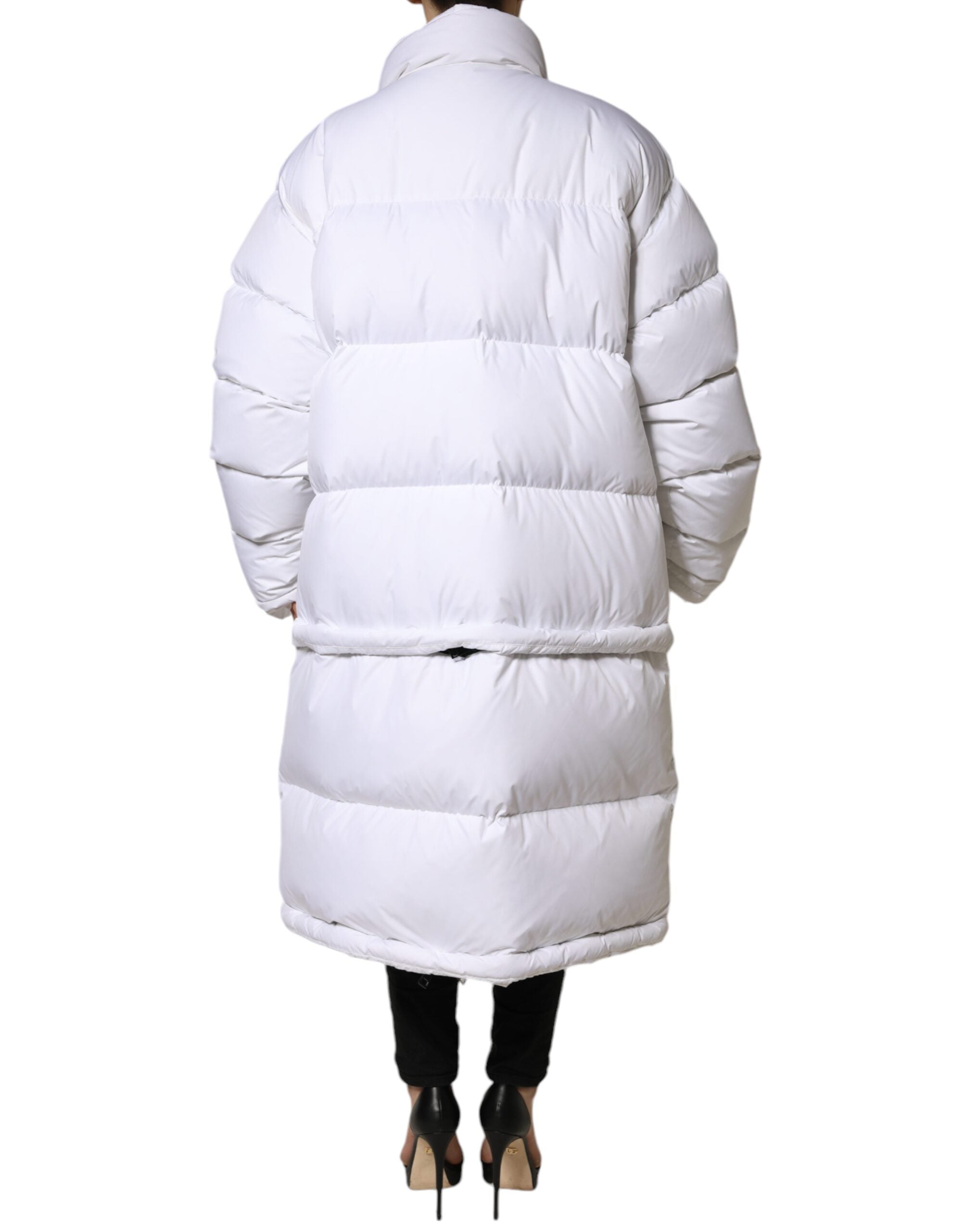 Indulge in the exquisite Dolce & Gabbana White Puffer Quilted Full Zip Coat Jacket, a masterpiece of Italian craftsmanship that elevates your style with unparalleled luxury.