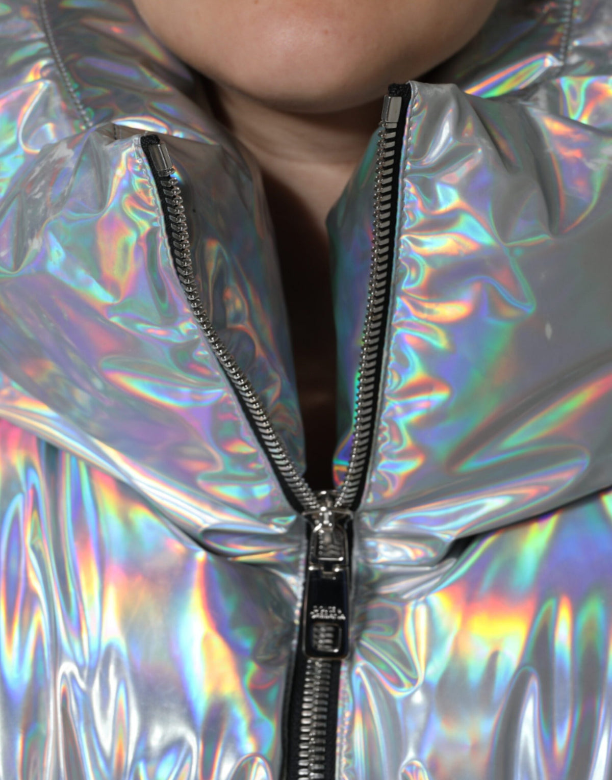 Elevate your style with the Dolce & Gabbana Silver Iridescent Puffer Full Zip Coat, a masterpiece of Italian craftsmanship in luxurious nylon, embodying modern elegance and allure.