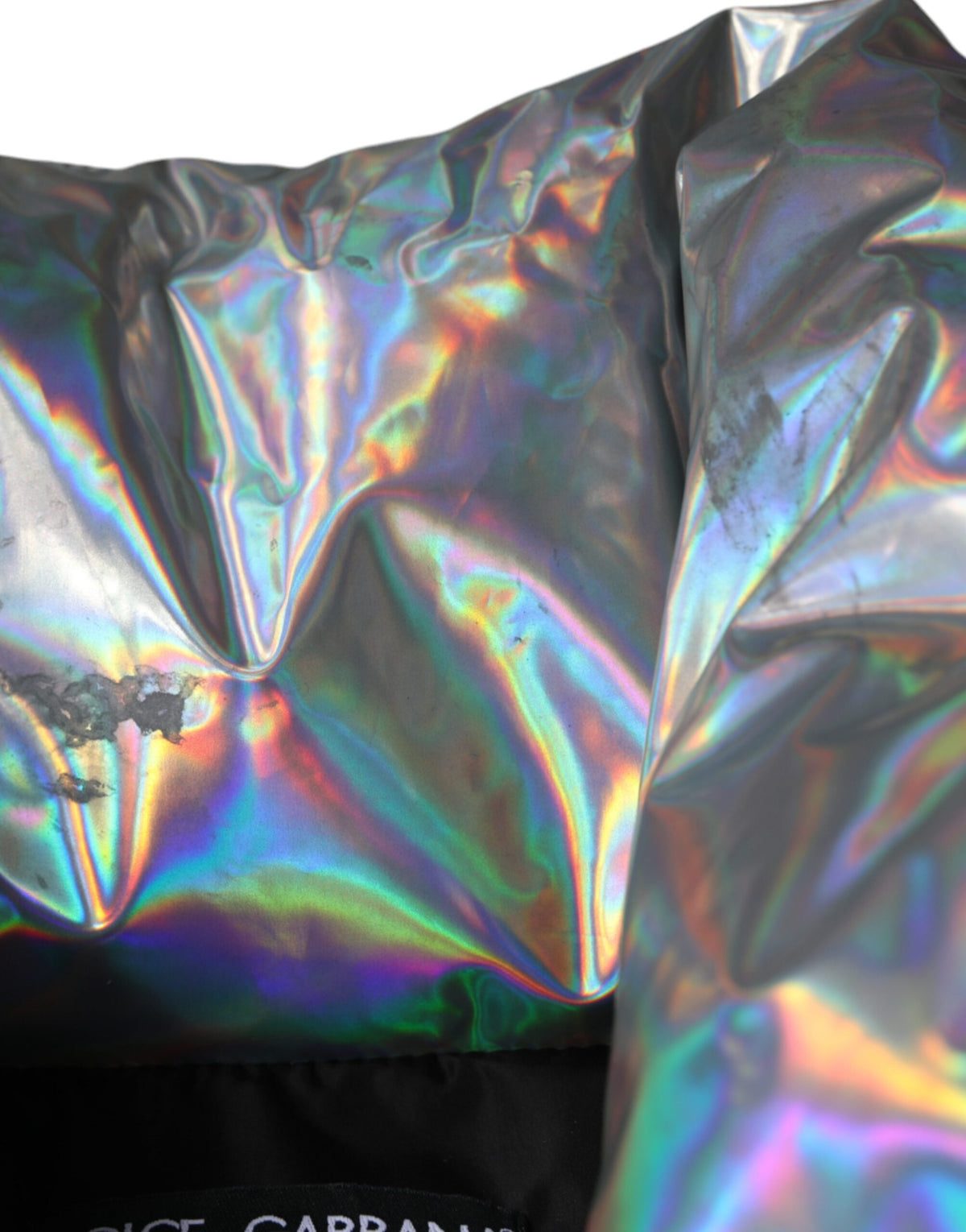 Elevate your style with the Dolce & Gabbana Silver Iridescent Puffer Full Zip Coat, a masterpiece of Italian craftsmanship in luxurious nylon, perfect for the discerning individual.
