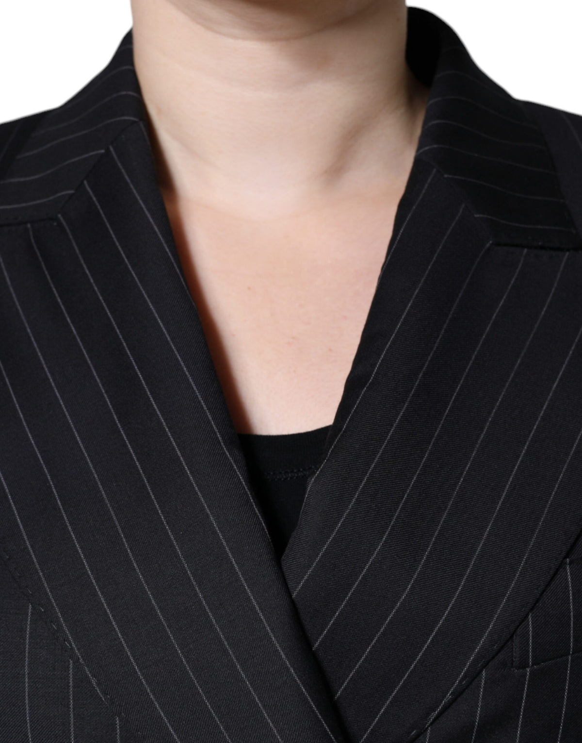 Experience the allure of the Dolce & Gabbana Black Striped Double Breasted Coat Jacket, crafted from luxurious virgin wool and silk, embodying timeless elegance and sophistication.