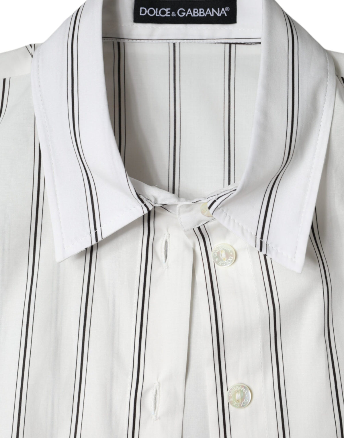 Elevate your wardrobe with the Dolce & Gabbana White Striped Collared Short Sleeve Polo Top, a masterpiece of Italian craftsmanship in luxurious cotton, perfect for any refined occasion.