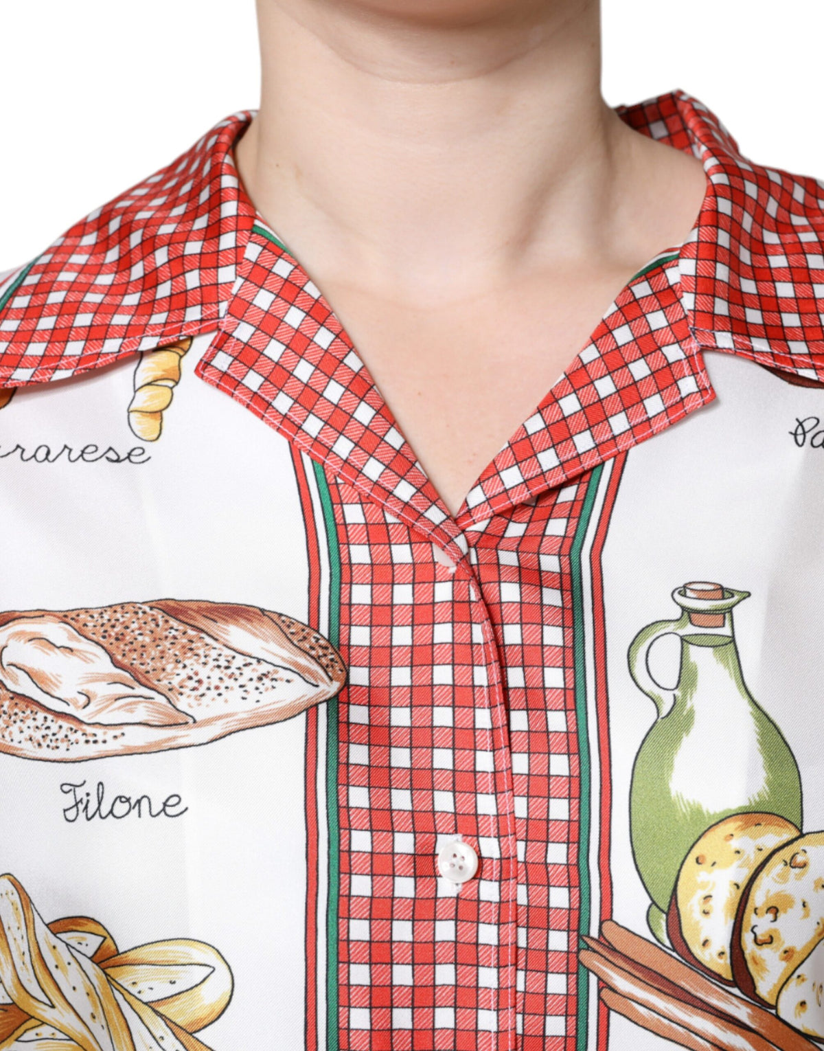 Indulge in the exquisite allure of the Dolce & Gabbana Multicolor Bread Print Collared Blouse, a silk masterpiece embodying artisanal elegance and timeless sophistication.