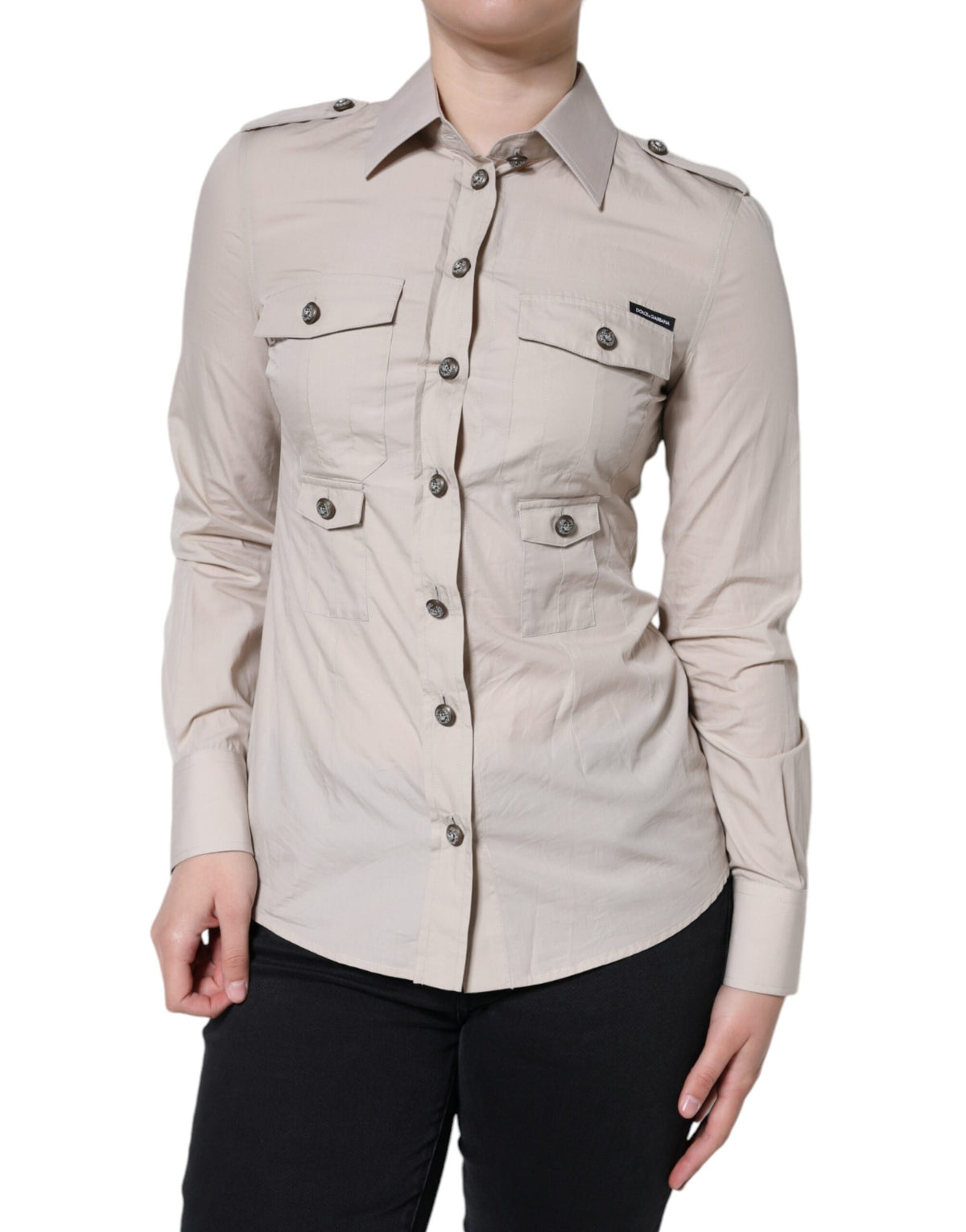 Elevate your wardrobe with the Dolce & Gabbana Beige Cotton Collared Button Down Shirt, a masterpiece of Italian craftsmanship that embodies timeless elegance and sophisticated allure.