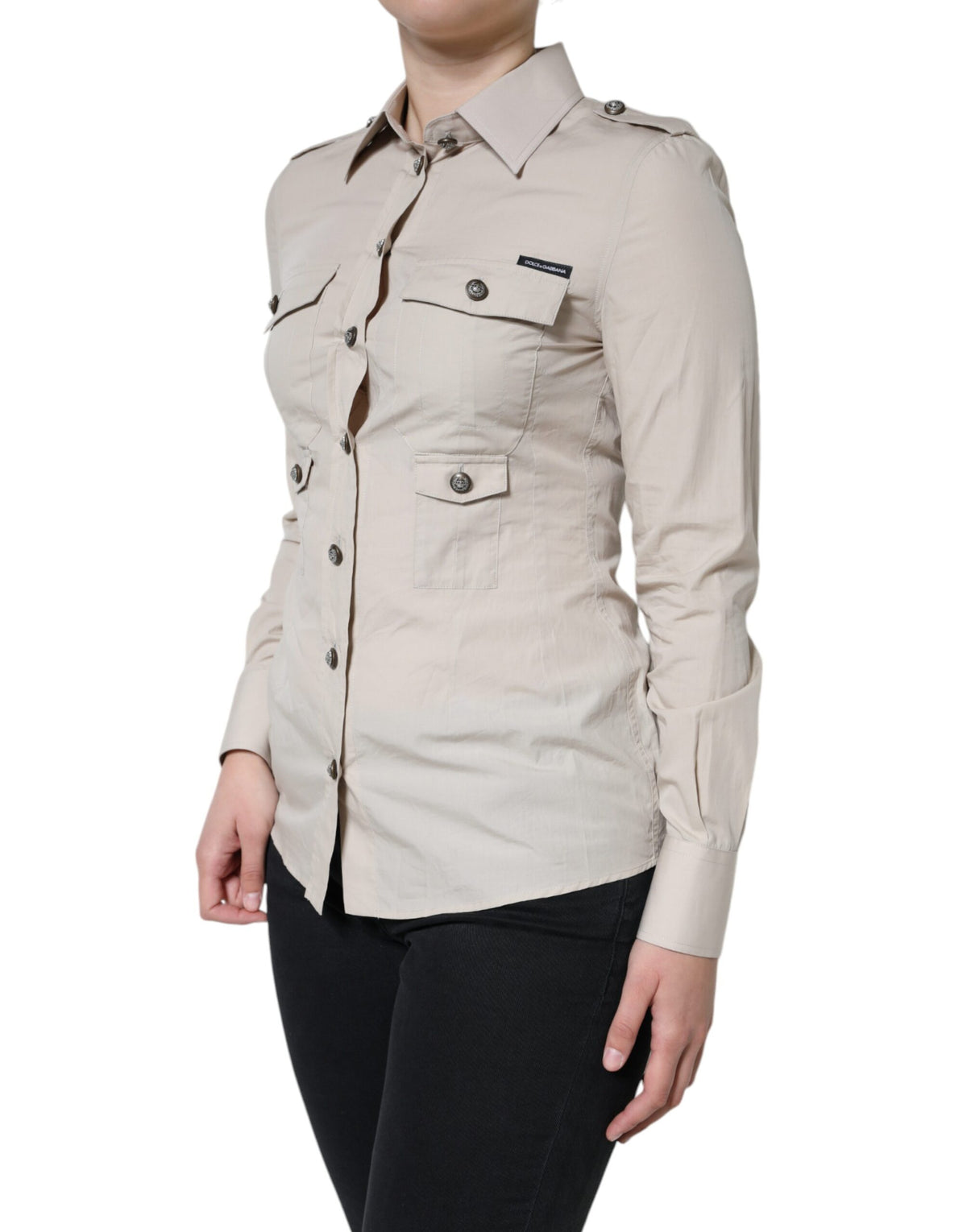 Elevate your wardrobe with the Dolce & Gabbana Beige Cotton Collared Button Down Shirt, a masterpiece of Italian craftsmanship that embodies timeless elegance and effortless sophistication.