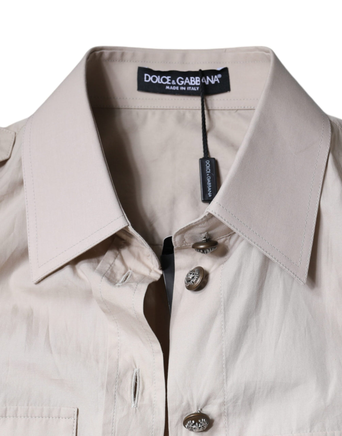Experience the allure of Dolce & Gabbana's Beige Cotton Collared Button Down Shirt, where exquisite Italian craftsmanship meets timeless elegance for the discerning individual.