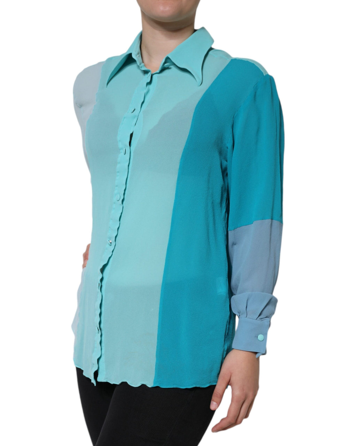 Indulge in the exquisite allure of the Dolce & Gabbana Multicolor Long Sleeve Button Blouse Top, a silk masterpiece that embodies luxury and sophistication for the discerning individual.