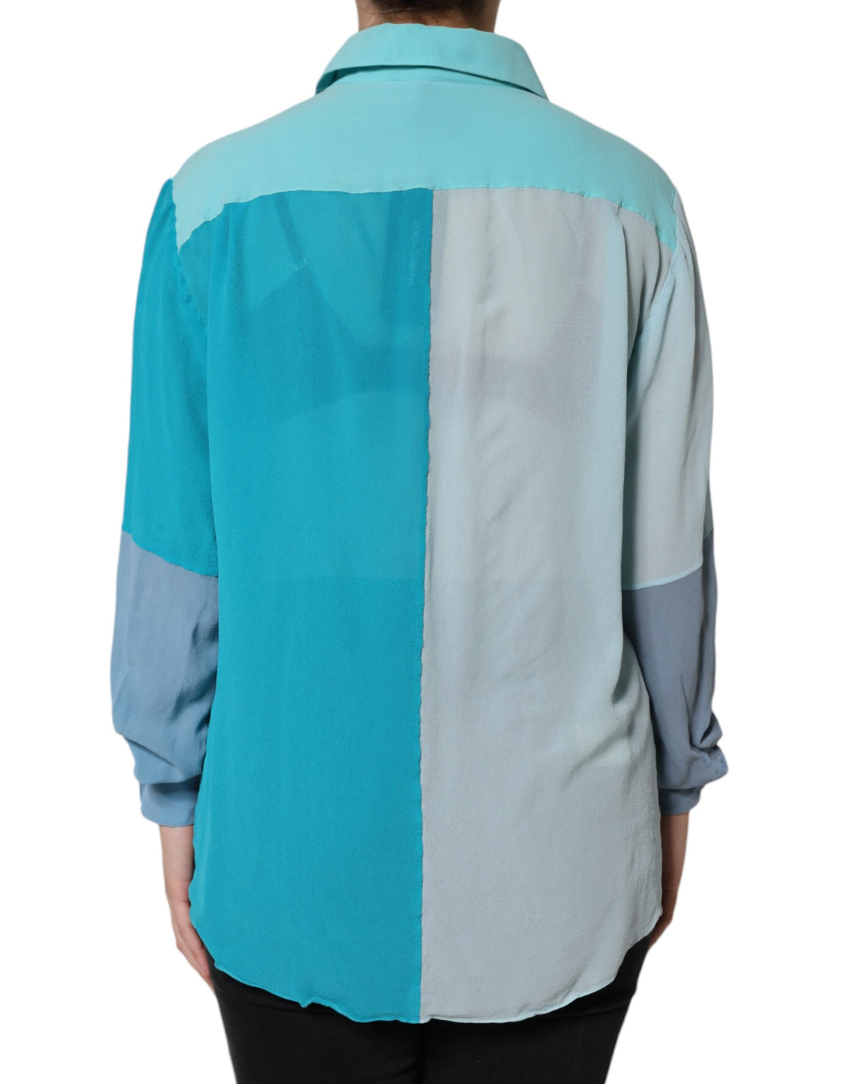 Experience the allure of Dolce & Gabbana's Multicolor Long Sleeve Button Blouse Top, a silk masterpiece that embodies sophistication and timeless elegance for the discerning individual.