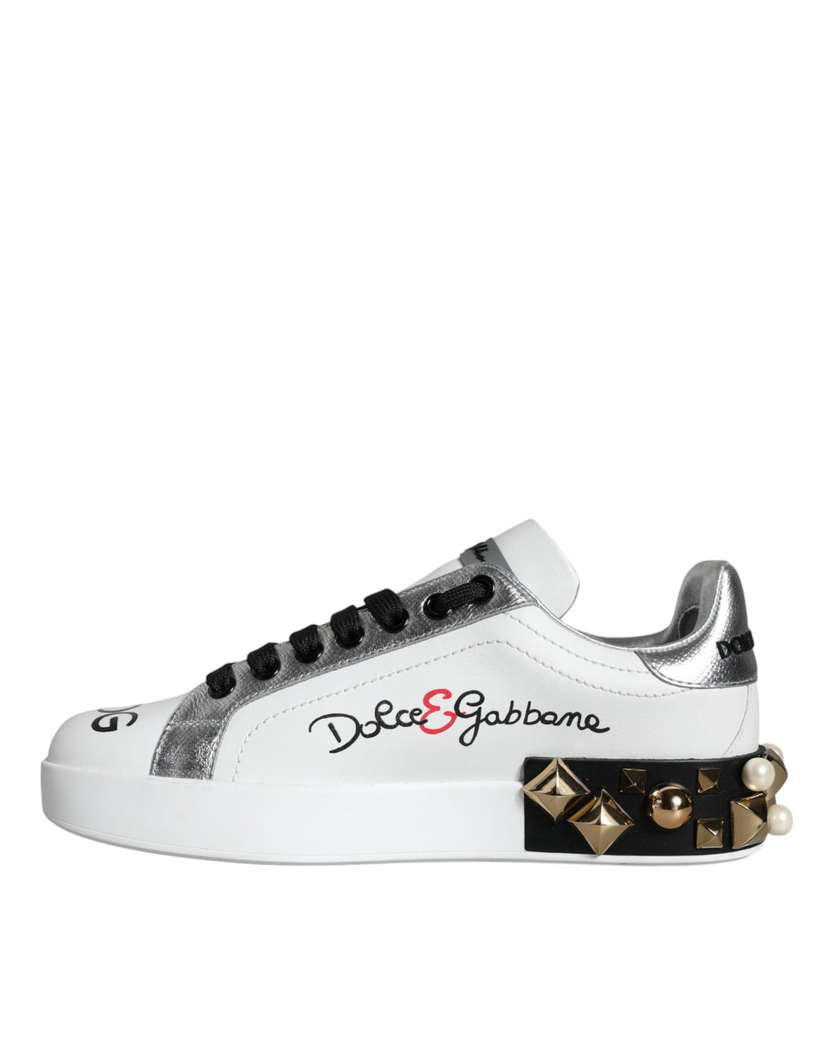 Indulge in the exquisite craftsmanship of Dolce & Gabbana's White Leather Floral Studded Sneakers, where luxurious design meets timeless elegance for the discerning individual.