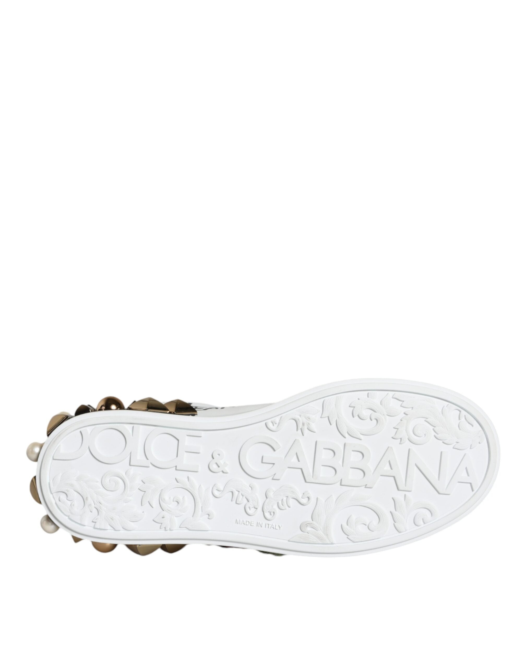 Step into a world of elegance with Dolce & Gabbana's White Leather Floral Studded Sneakers, where exquisite craftsmanship meets luxurious comfort for the discerning individual.