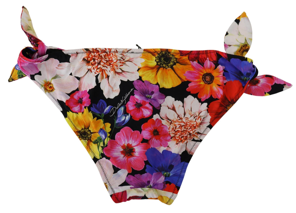 Indulge in the exquisite Dolce & Gabbana Black Floral Print Swimsuit Bikini Bottom, crafted from premium materials for a sophisticated beach experience that embodies luxury and elegance.