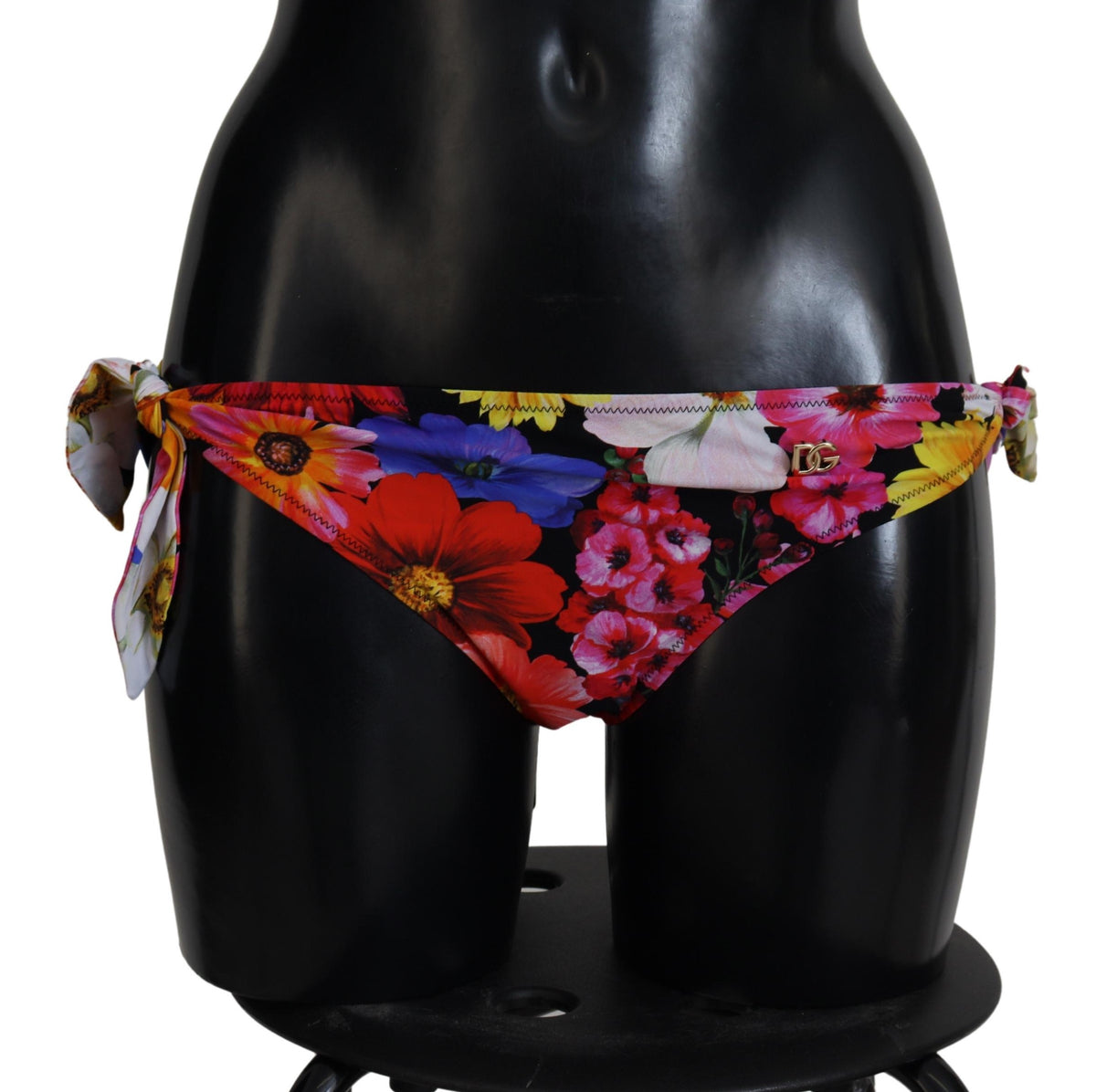 Indulge in the exquisite Dolce & Gabbana Black Floral Print Swimsuit Bikini Bottom, crafted from luxurious materials for a sophisticated beach experience that embodies elegance and allure.