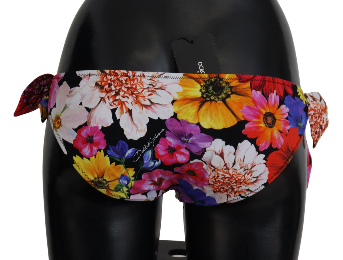 Indulge in the exquisite Dolce & Gabbana Black Floral Print Swimsuit Bikini Bottom, crafted from premium materials for a sophisticated beach experience that embodies luxury and elegance.