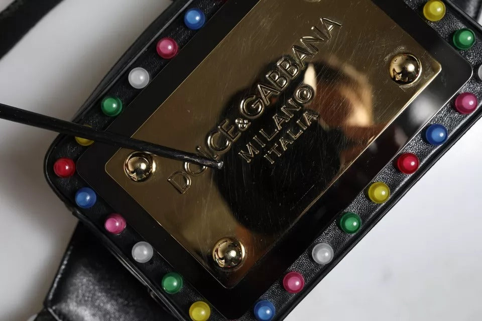 Discover the Dolce & Gabbana Black Leather LED Logo Belt Fanny Pack Bag, where Italian craftsmanship meets luxurious design, perfect for the discerning modern individual.