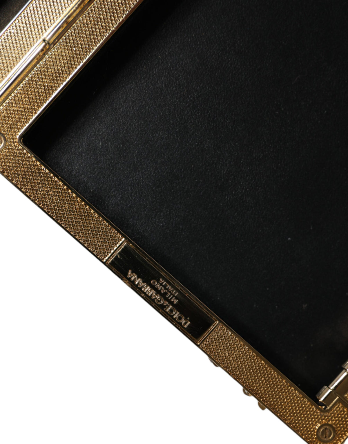 Indulge in the exquisite Dolce & Gabbana Silver Sequined Clutch, a luxurious blend of polyester and brass, perfect for elevating your evening allure with timeless elegance.