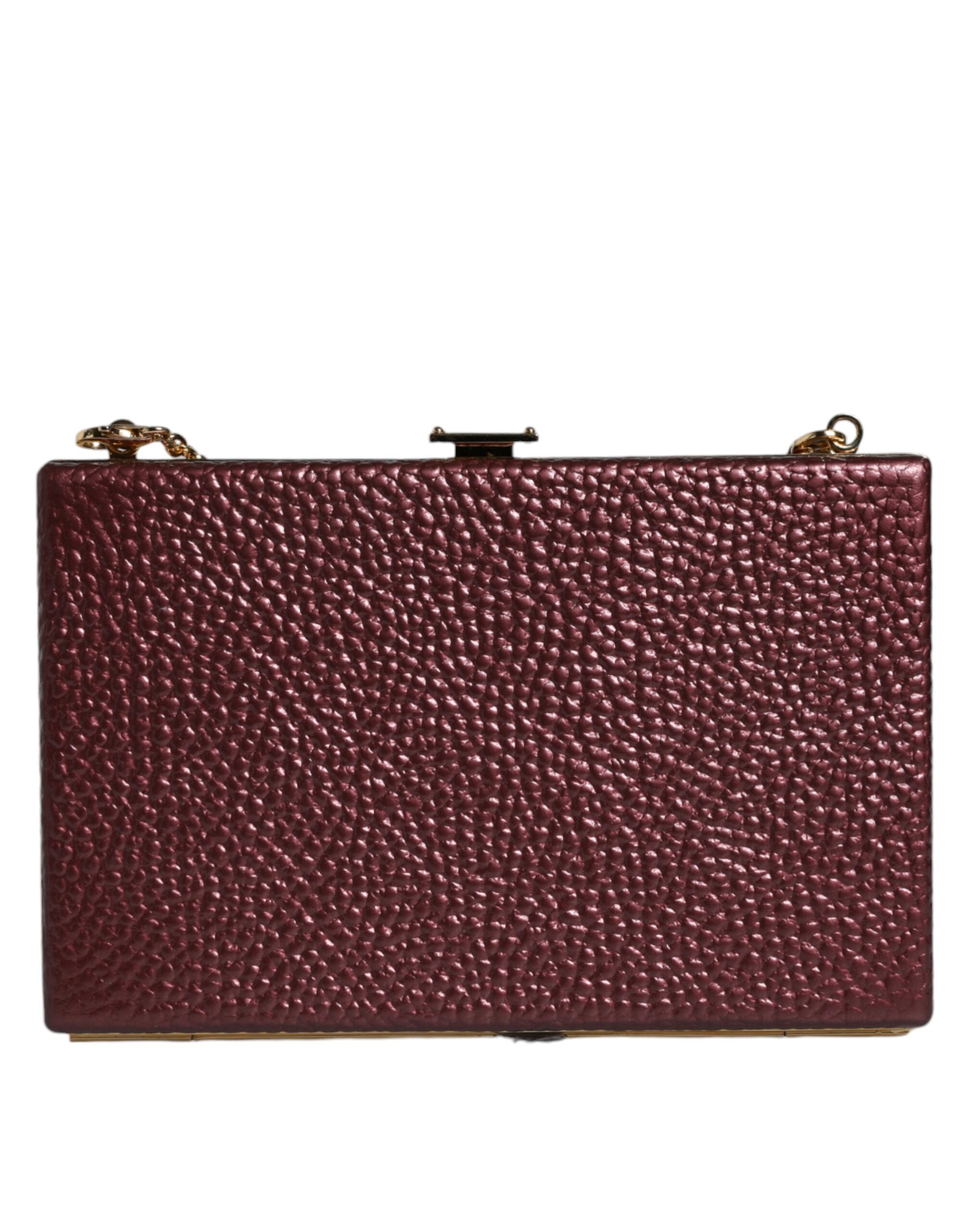 Elevate your elegance with the Dolce & Gabbana Maroon Leather Clutch, a masterpiece of Italian craftsmanship, perfect for sophisticated soirées and timeless allure.