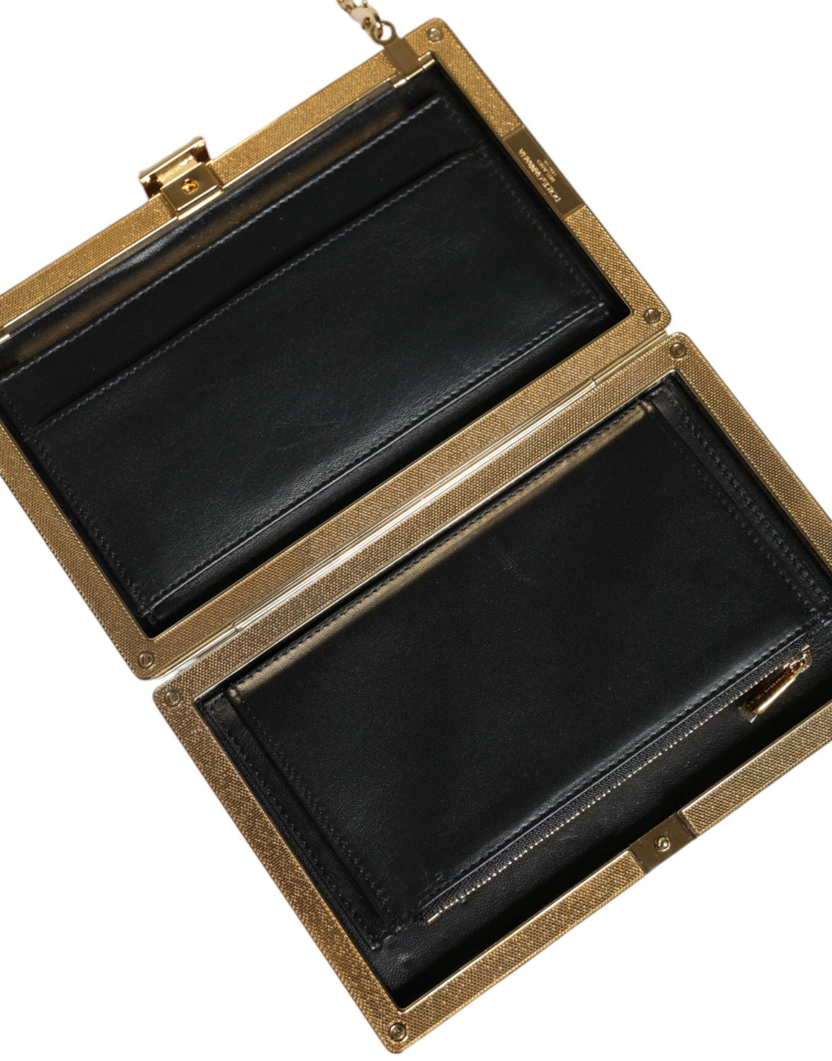 Elevate your elegance with the Dolce & Gabbana Maroon Leather Clutch, a masterpiece of Italian craftsmanship that embodies luxury and sophistication for every occasion.