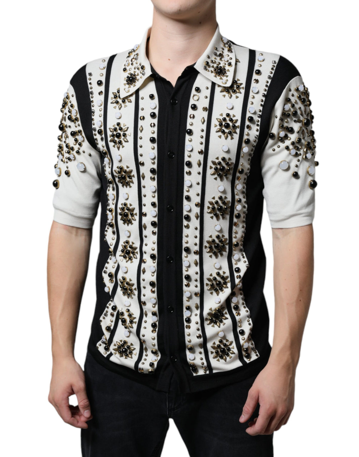 Indulge in the exquisite Dolce & Gabbana White Black Silk Studded Stone Crystal Shirt, where luxurious silk meets artful embellishments, embodying timeless elegance and sophisticated allure.