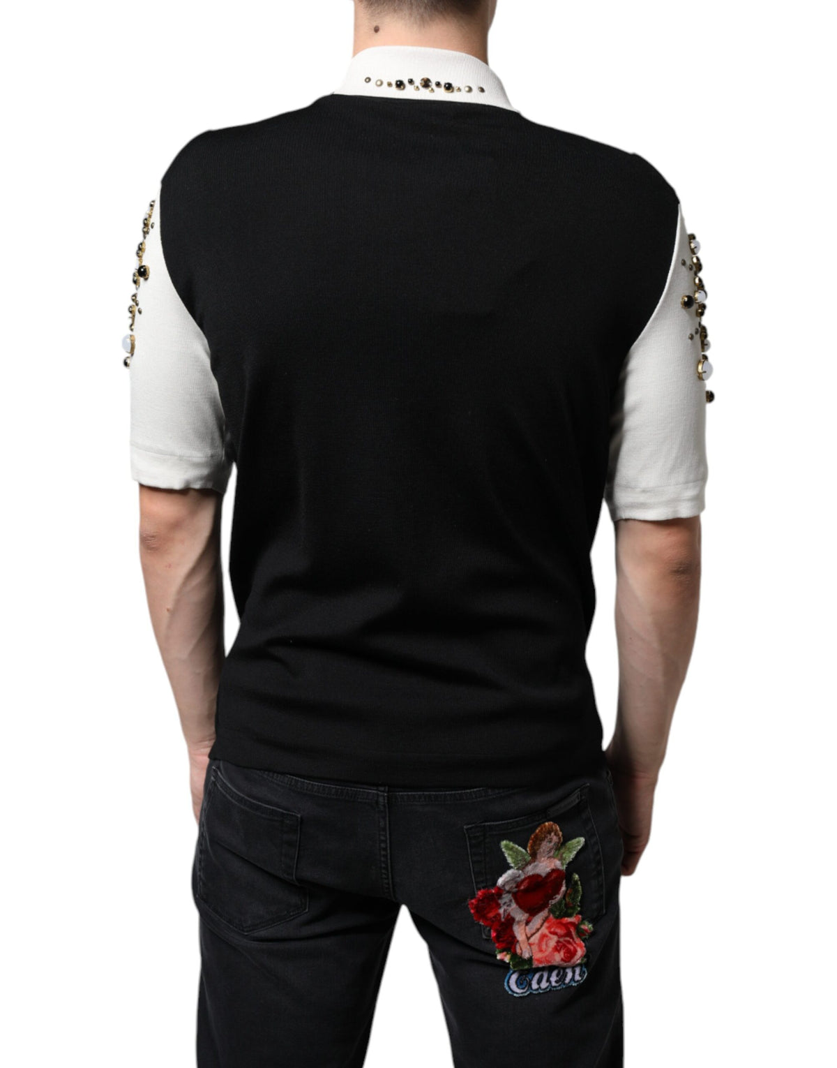 Indulge in the exquisite Dolce & Gabbana White Black Silk Studded Stone Crystal Shirt, where luxurious silk and meticulous craftsmanship elevate your style to unparalleled sophistication.