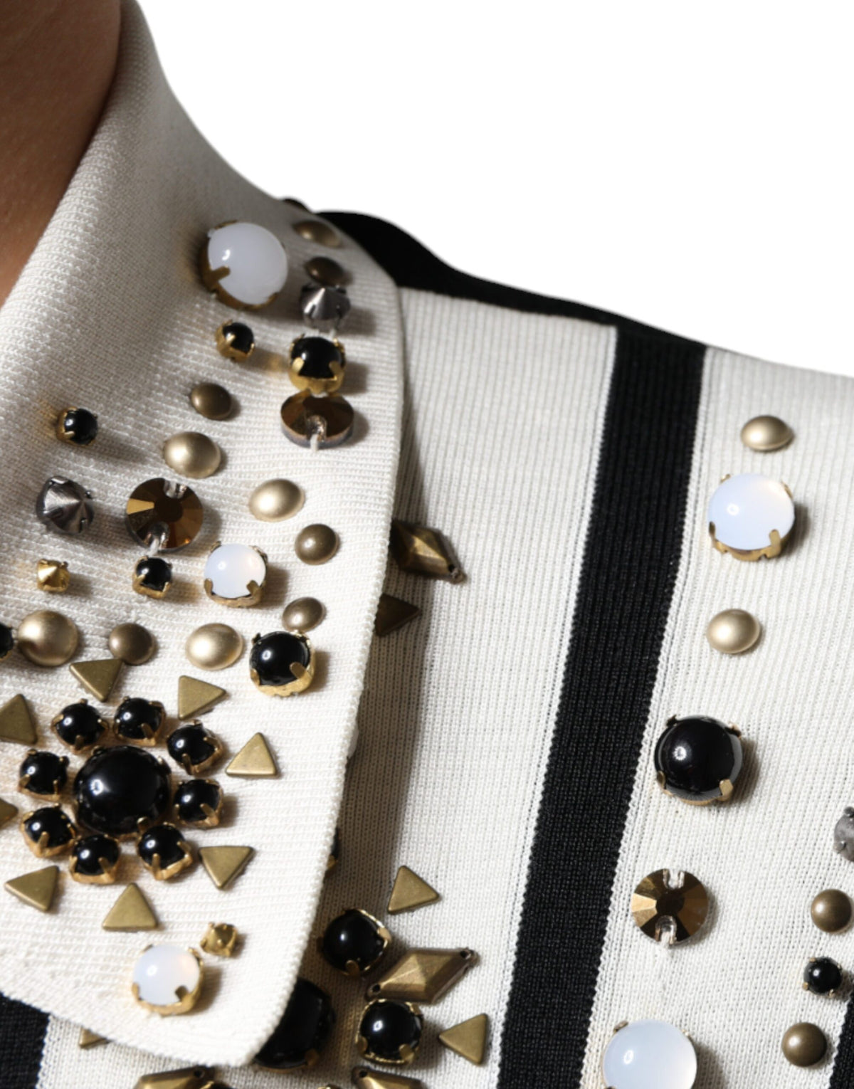 Indulge in the exquisite Dolce & Gabbana White Black Silk Studded Stone Crystal Shirt, a masterpiece of Italian craftsmanship that elevates your style with timeless elegance and luxurious allure.