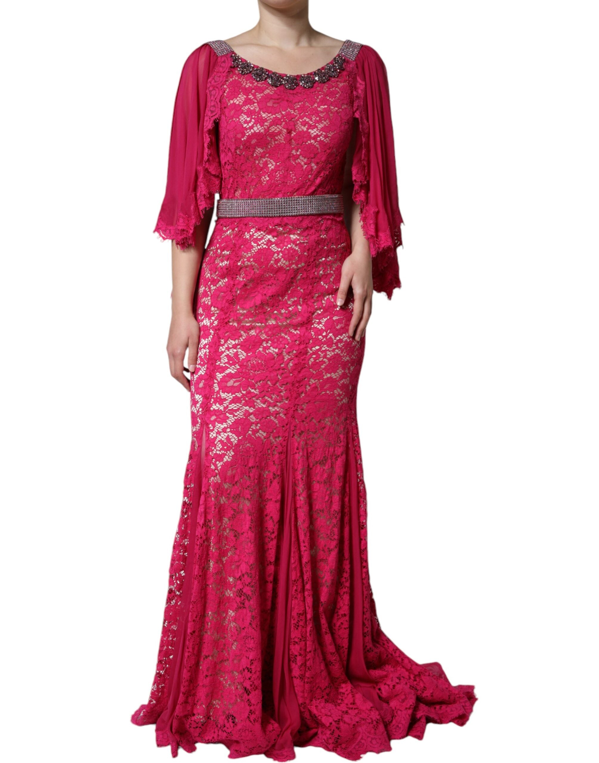 Experience the allure of the Dolce & Gabbana Pink Lace Crystal Sheath Long Gown, a masterpiece of Italian craftsmanship that embodies luxury and sophistication for every occasion.