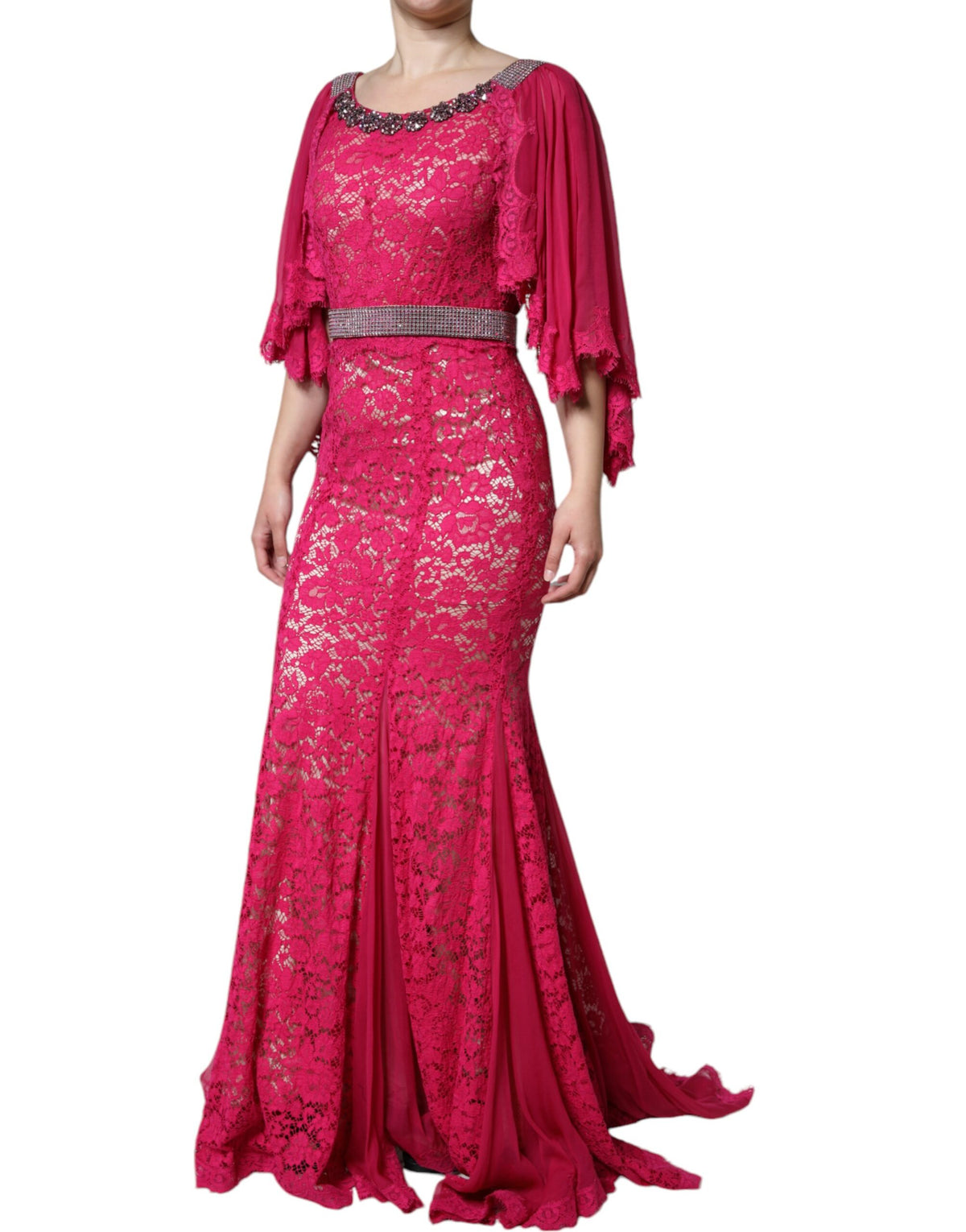 Experience the allure of the Dolce & Gabbana Pink Lace Crystal Sheath Long Gown, a masterpiece of Italian craftsmanship that embodies luxury and elegance for unforgettable moments.