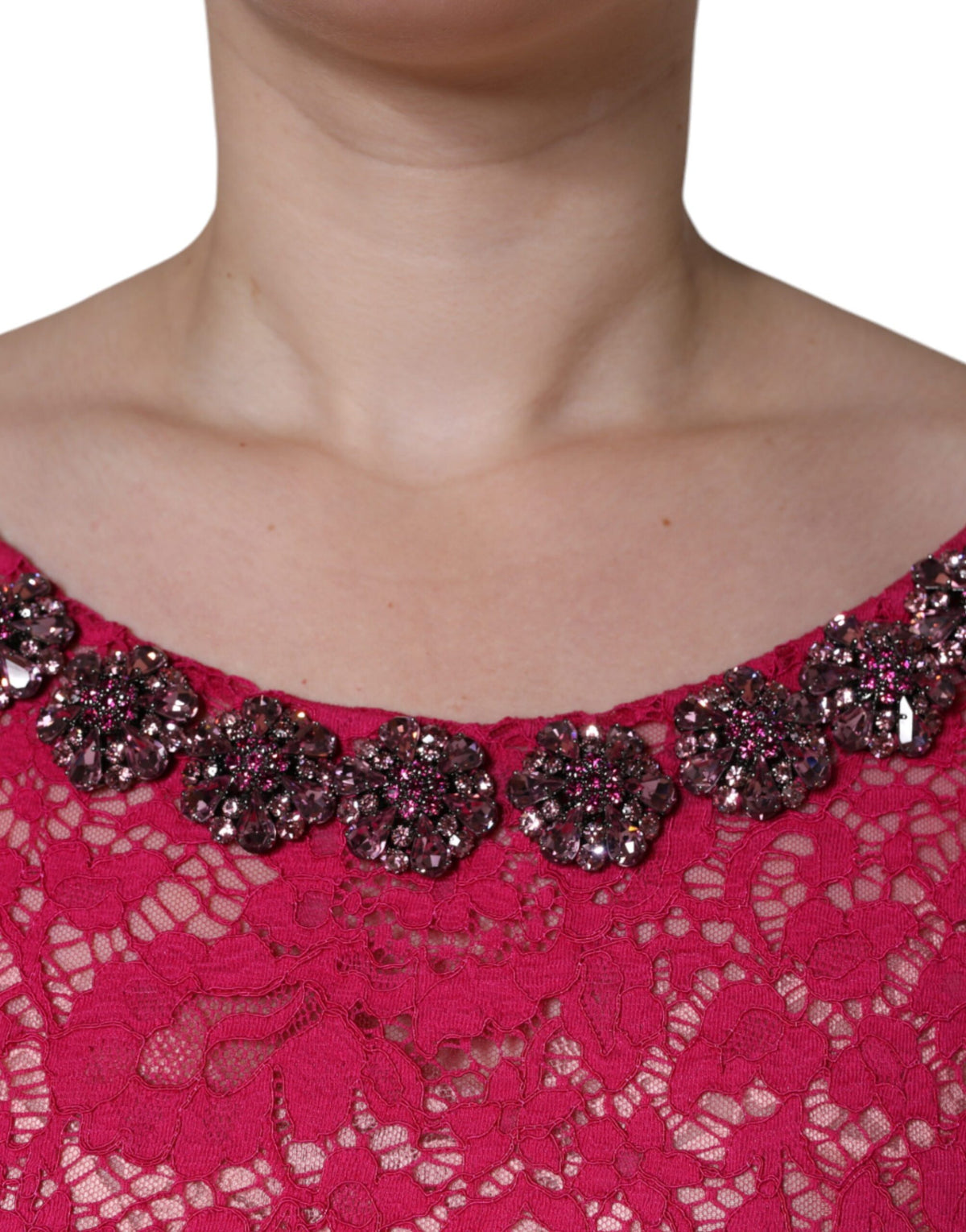 Experience the allure of Dolce & Gabbana's Pink Lace Crystal Sheath Long Gown, a masterpiece of Italian craftsmanship that embodies luxury and sophistication for any celebration.