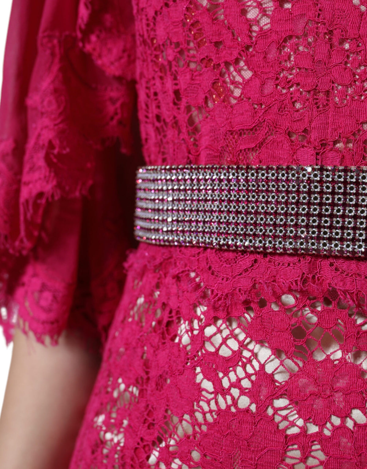 Experience the exquisite Dolce & Gabbana Pink Lace Crystal Sheath Long Gown, a masterpiece of Italian craftsmanship that embodies luxury and timeless elegance for any sophisticated occasion.